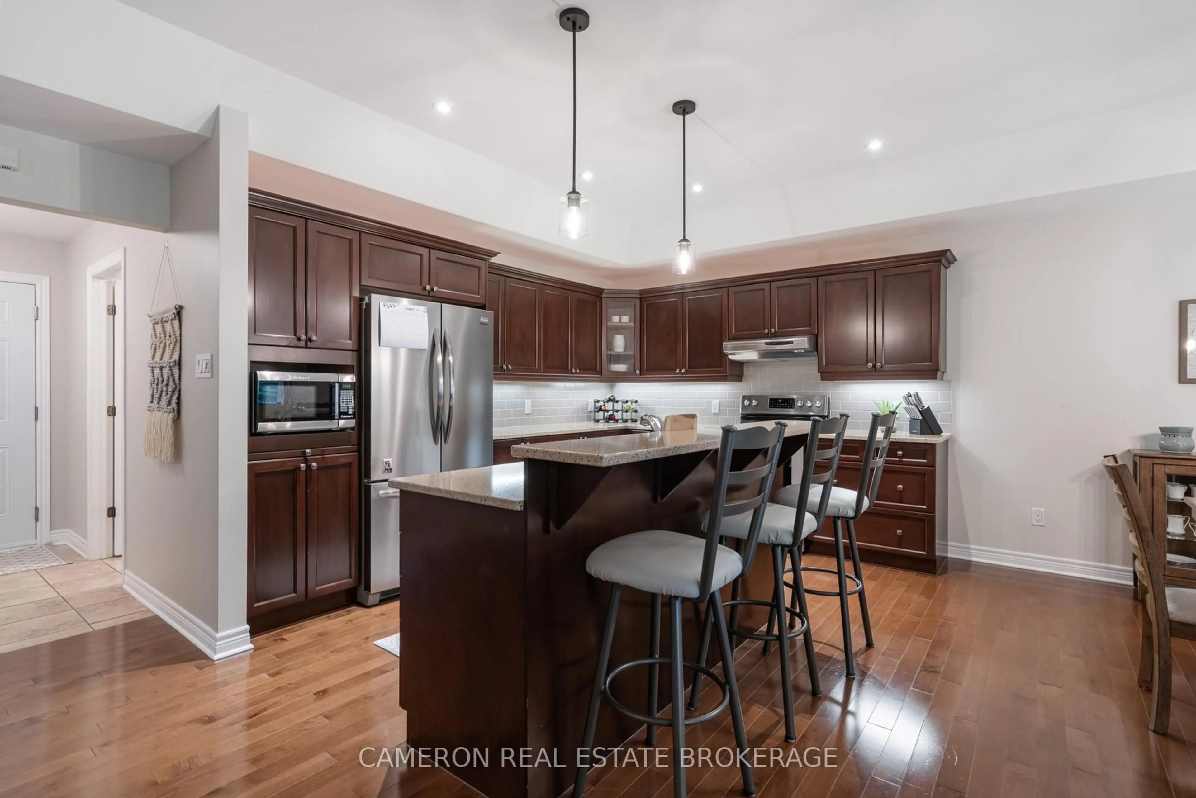 Open concept kitchen, wood/laminate floor for 1217 Innwood Ave, Cornwall Ontario K6J 5V4