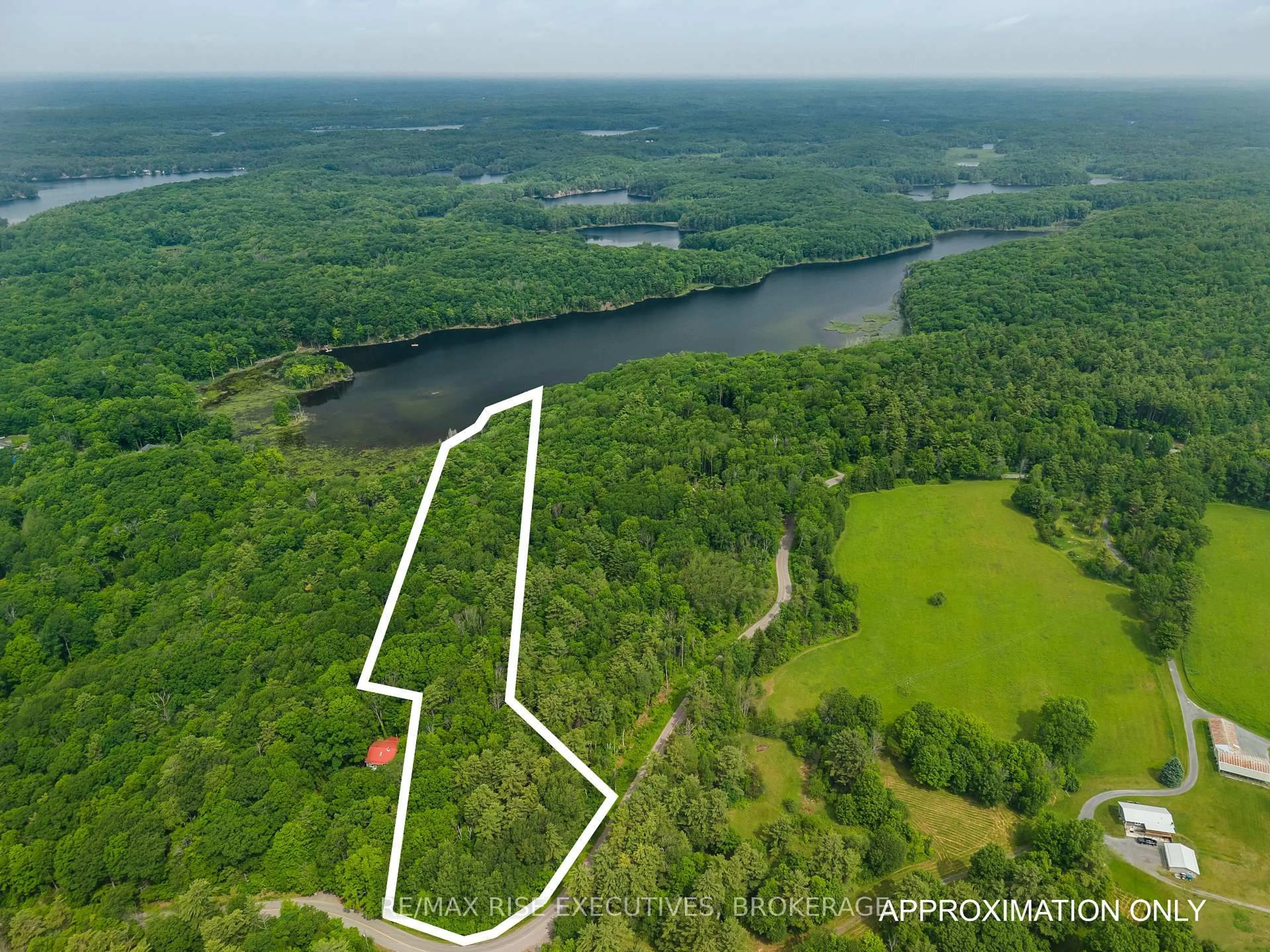 A pic from outside/outdoor area/front of a property/back of a property/a pic from drone, water/lake/river/ocean view for 2120 Charlie Green Rd, Perth Road Ontario K0H 2L0