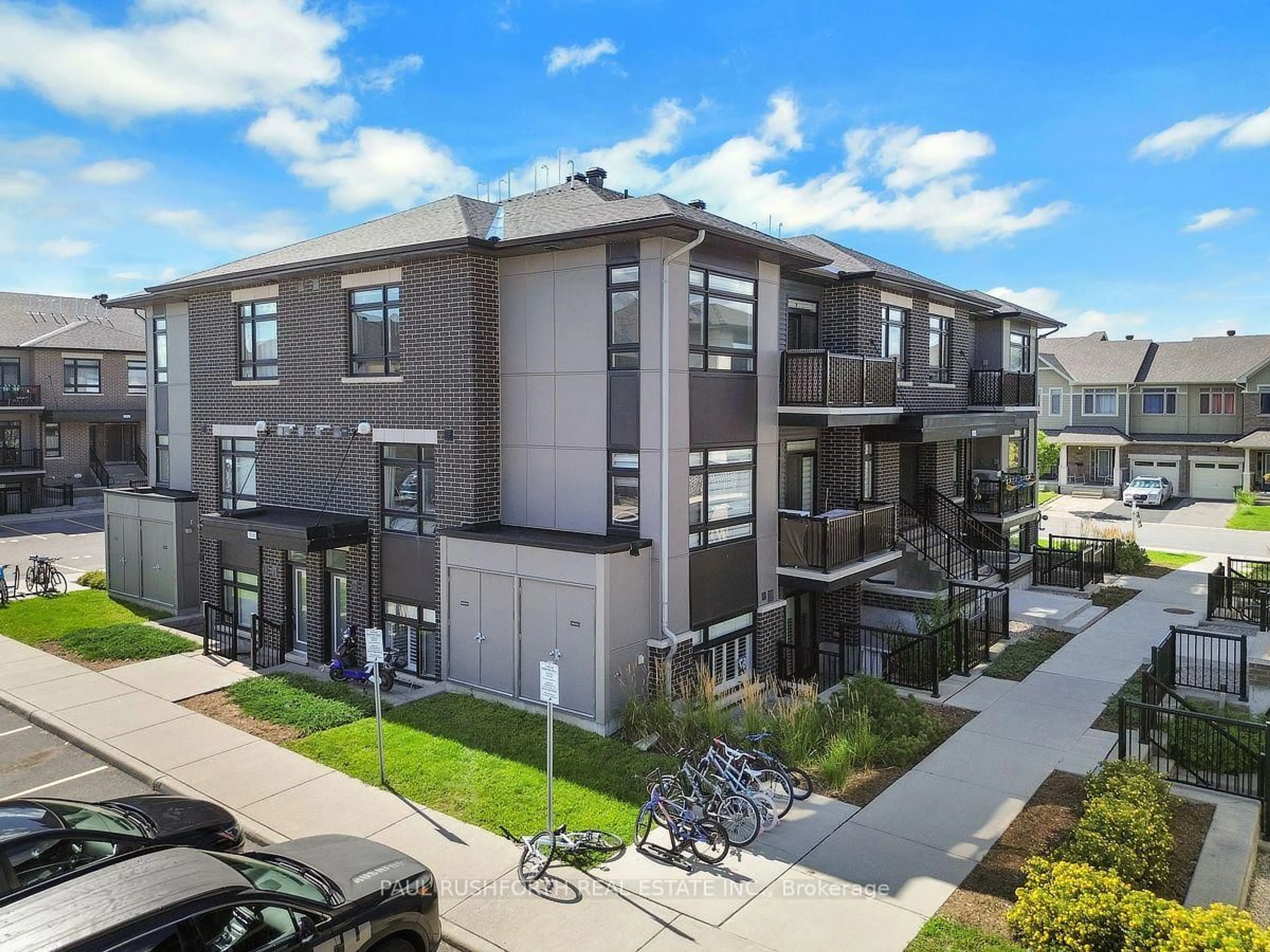 A pic from outside/outdoor area/front of a property/back of a property/a pic from drone, street for 310 Tulum Cres #J, Ottawa Ontario K2S 2Y4