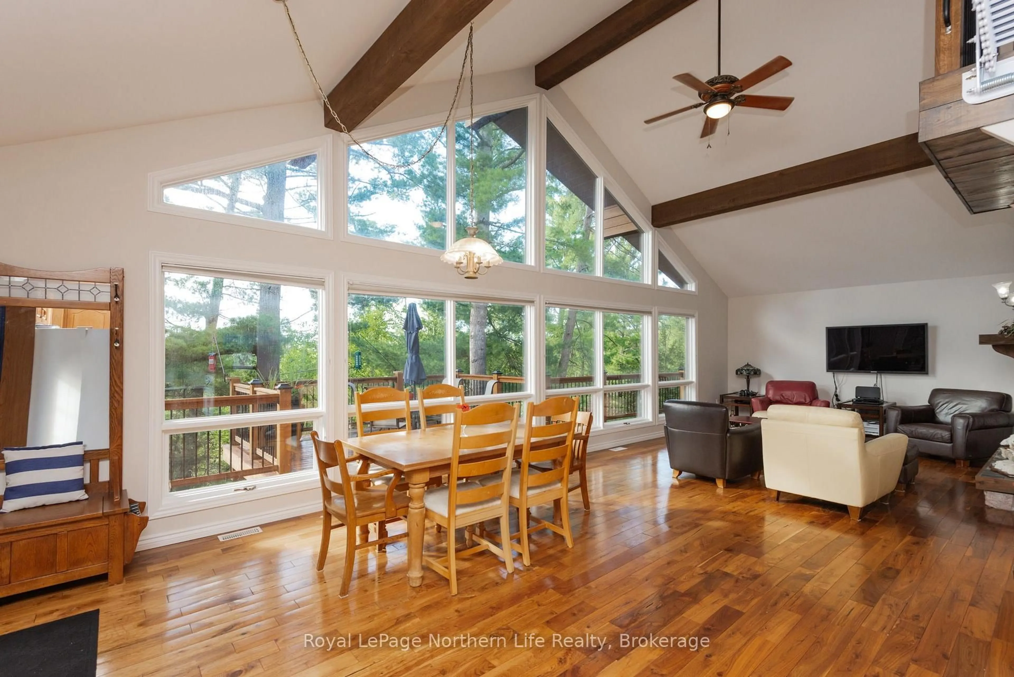 Open concept kitchen, wood/laminate floor for 41 Pebble Beach Dr, Callander Ontario P0H 1H0