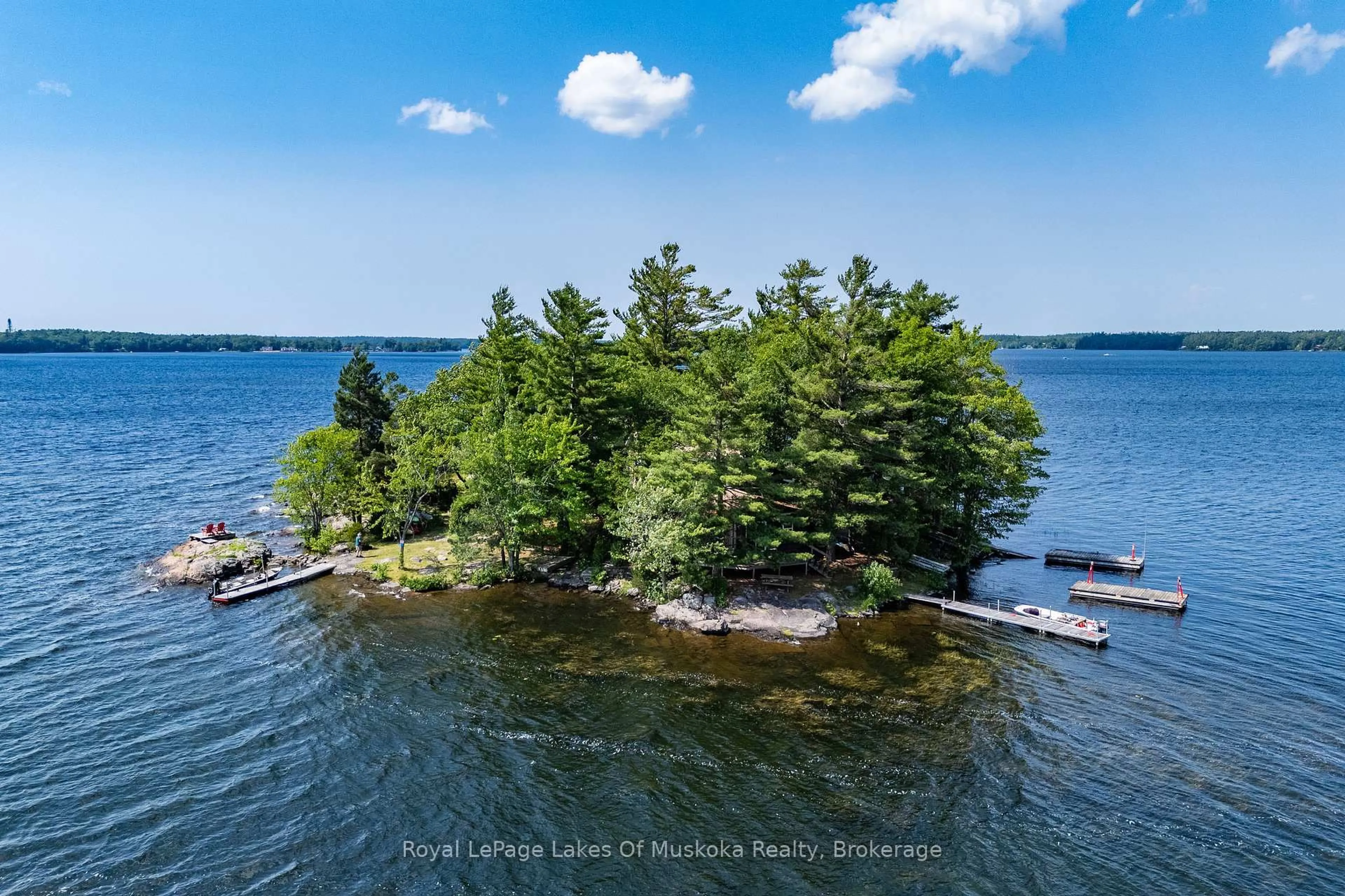A pic from outside/outdoor area/front of a property/back of a property/a pic from drone, water/lake/river/ocean view for 1 Island 2SL Island, Gravenhurst Ontario P1P 1R1