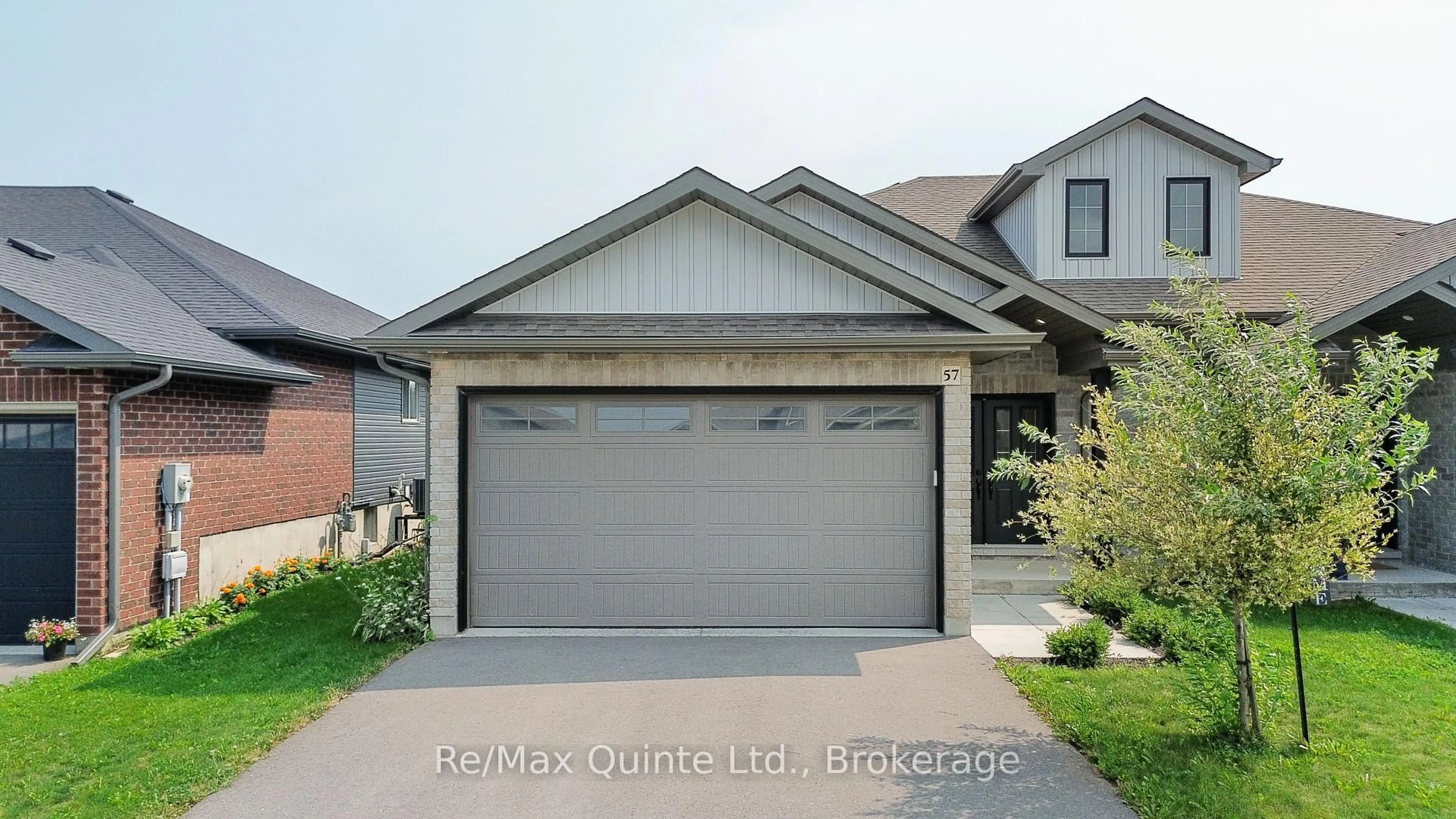Home with brick exterior material, street for 57 Hillside Meadow Dr, Quinte West Ontario K8V 0J5