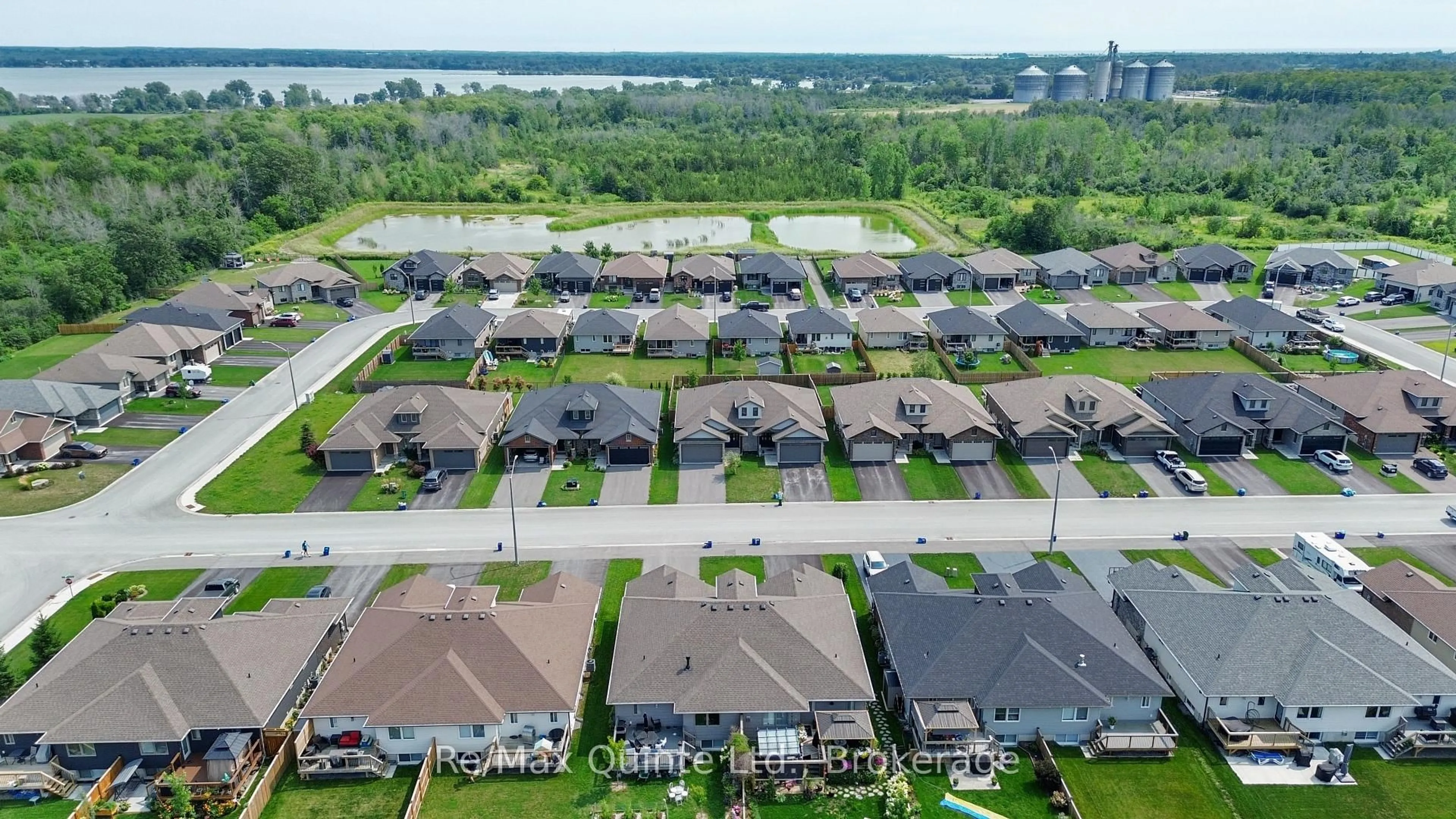 A pic from outside/outdoor area/front of a property/back of a property/a pic from drone, water/lake/river/ocean view for 57 Hillside Meadow Dr, Quinte West Ontario K8V 0J5
