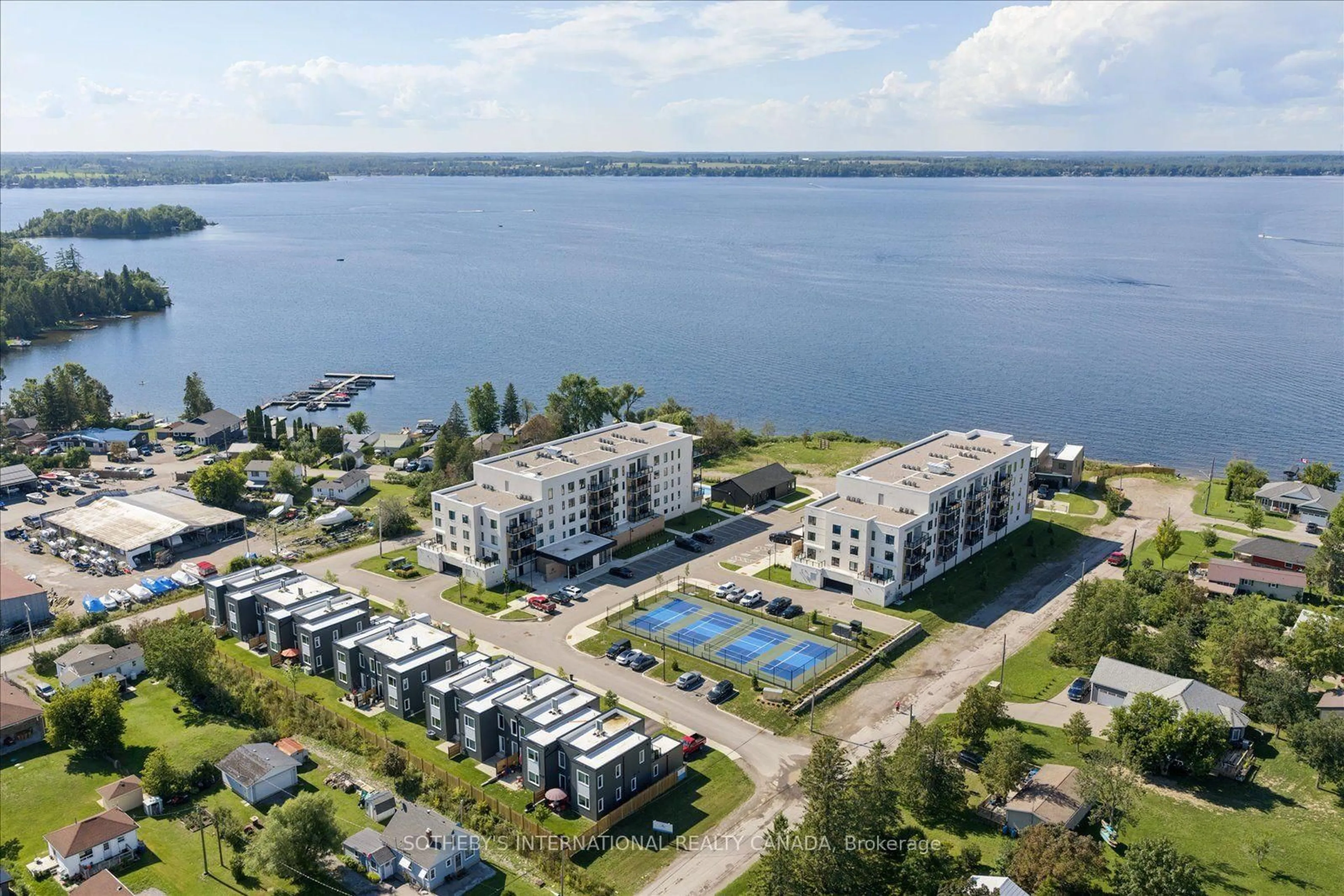 A pic from outside/outdoor area/front of a property/back of a property/a pic from drone, water/lake/river/ocean view for 19B West St #201, Kawartha Lakes Ontario K0M 1N0