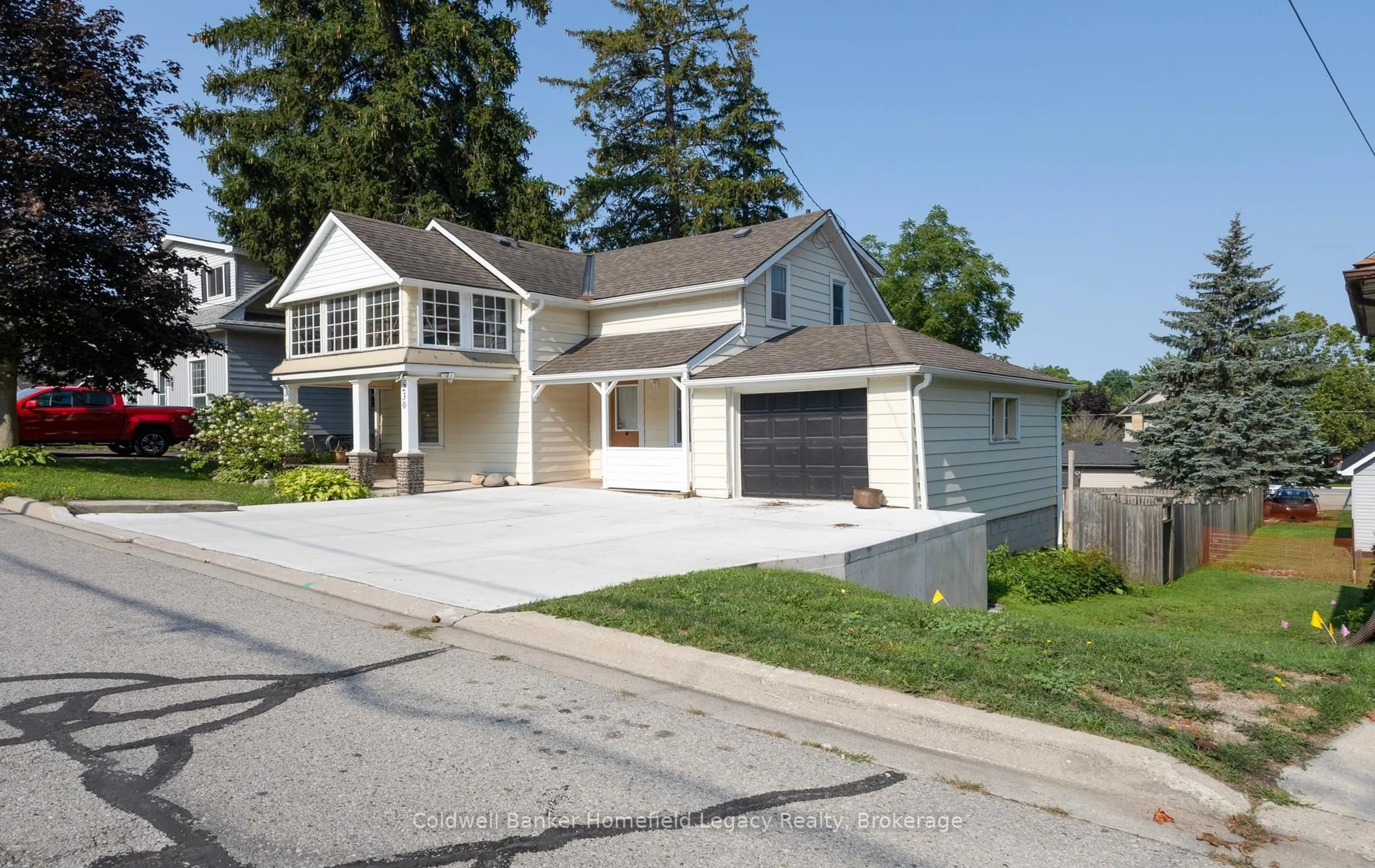 Home with vinyl exterior material, street for 230 Church St, St. Marys Ontario N4X 1Z4