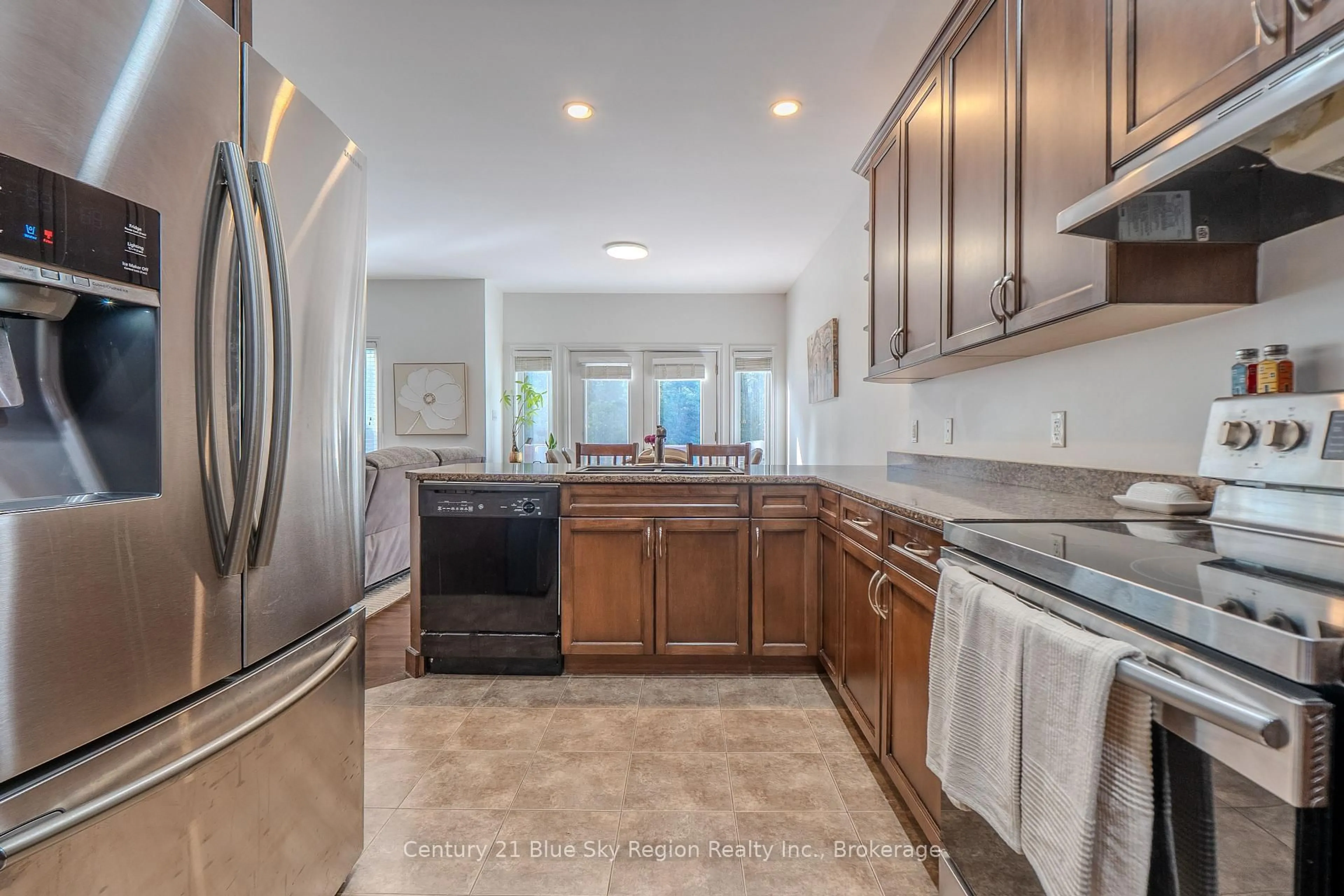 Open concept kitchen, ceramic/tile floor for 24 Osprey Cres, Callander Ontario P0H 1H0