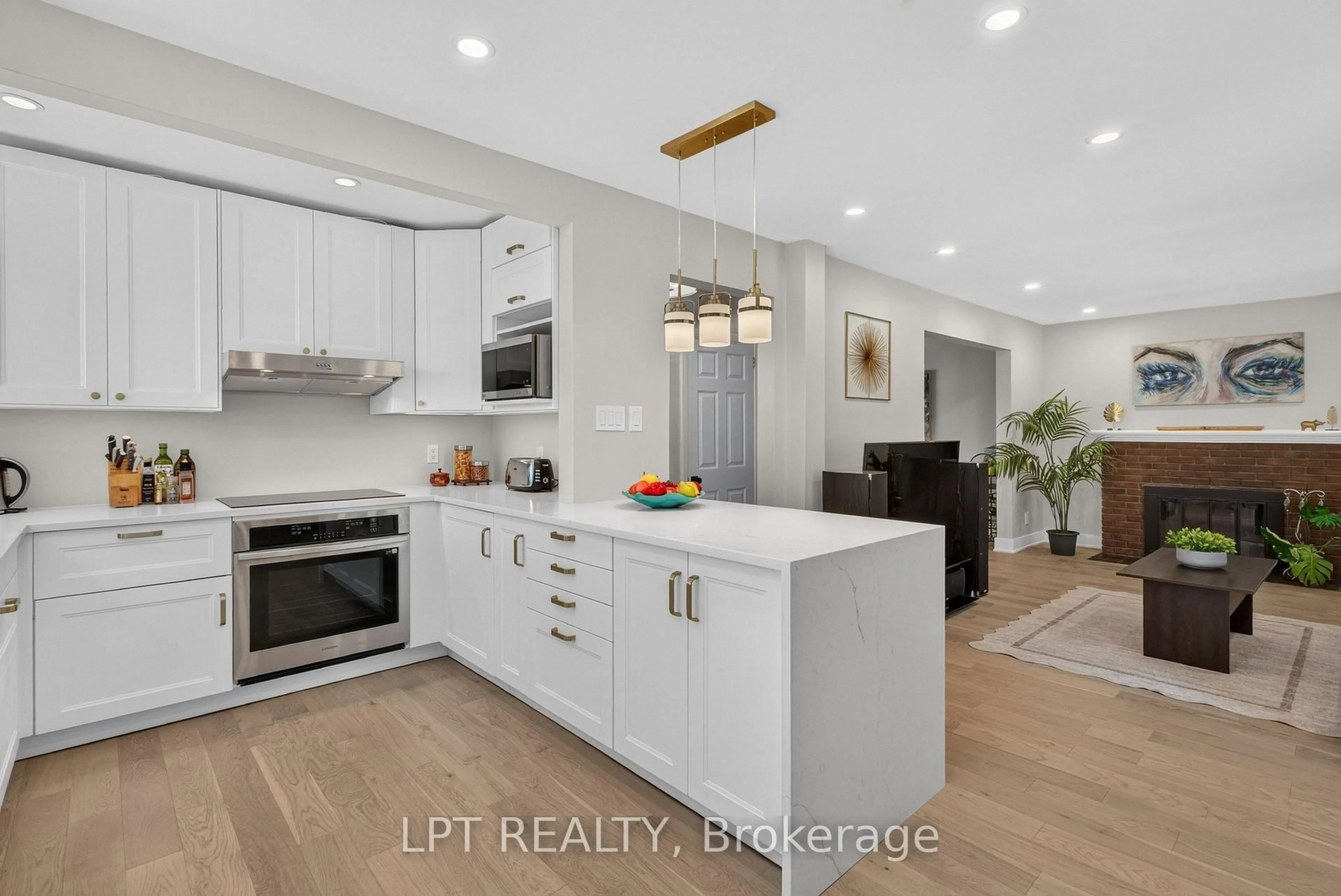 Open concept kitchen, wood/laminate floor for 337 Joffre-Belanger Way, Ottawa Ontario K1L 5K5