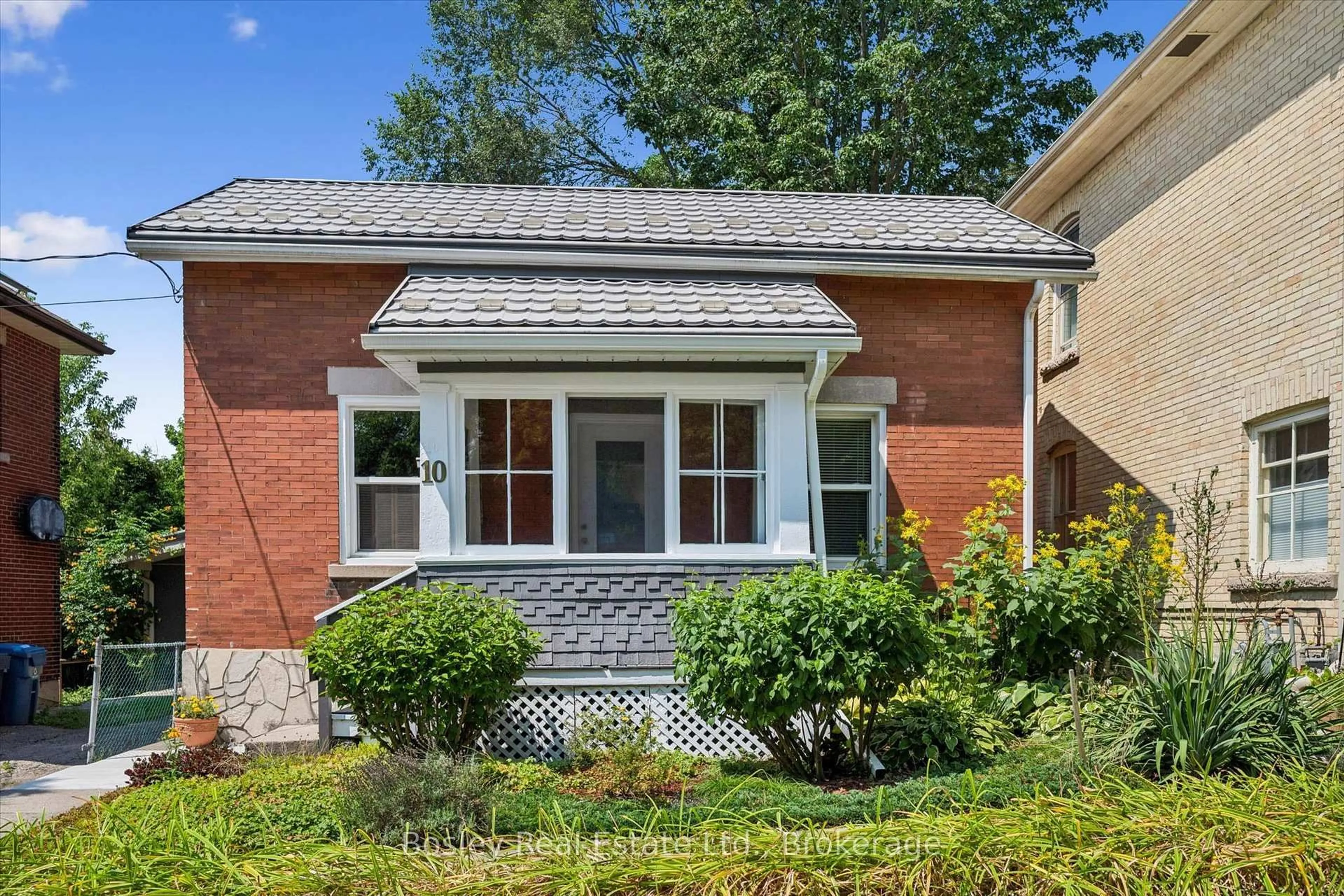 Home with brick exterior material, street for 10 Pearl St, Guelph Ontario N1E 2E3