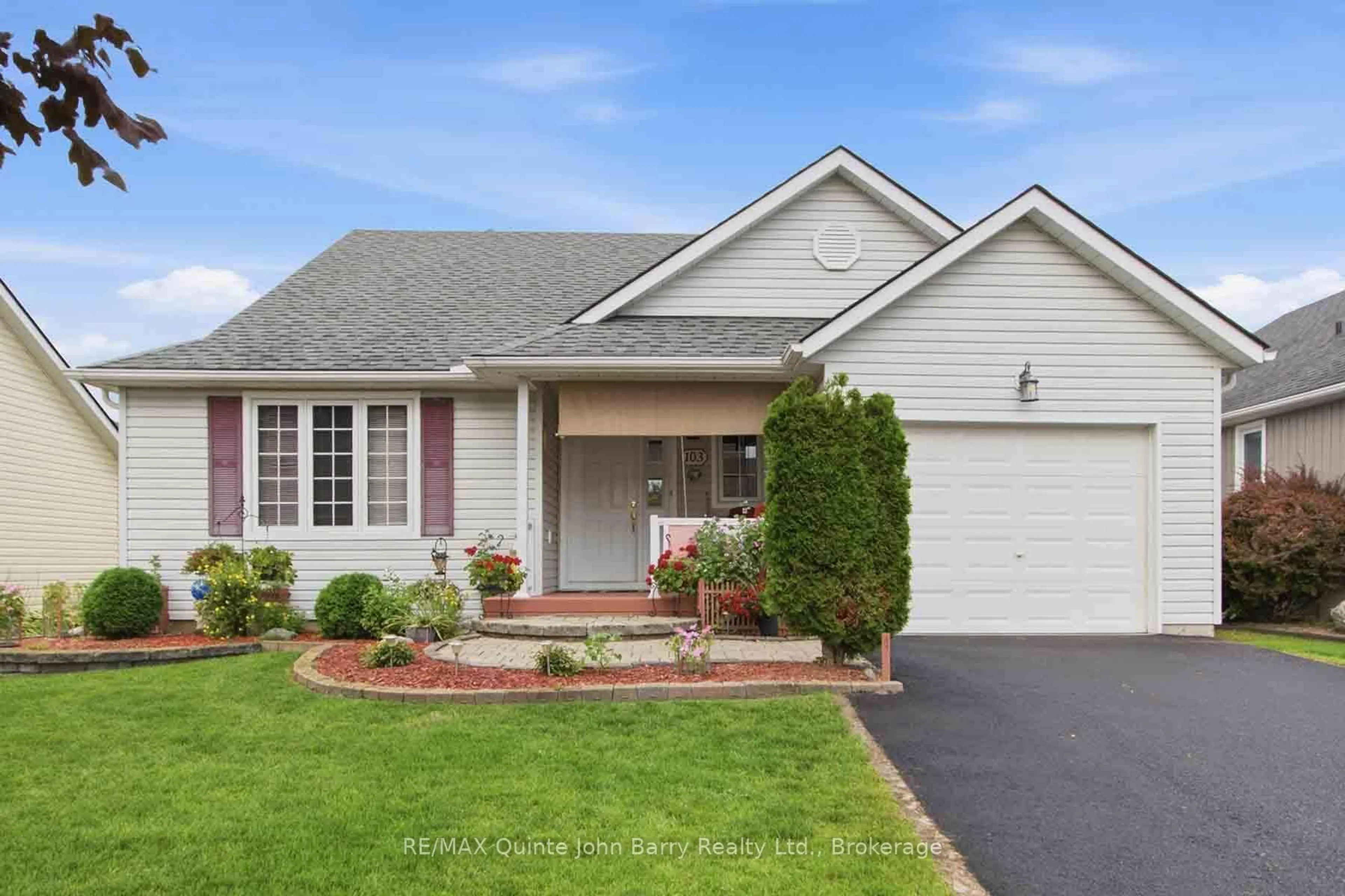 Home with vinyl exterior material, street for 103 Mills Rd, Brighton Ontario K0K 1H0