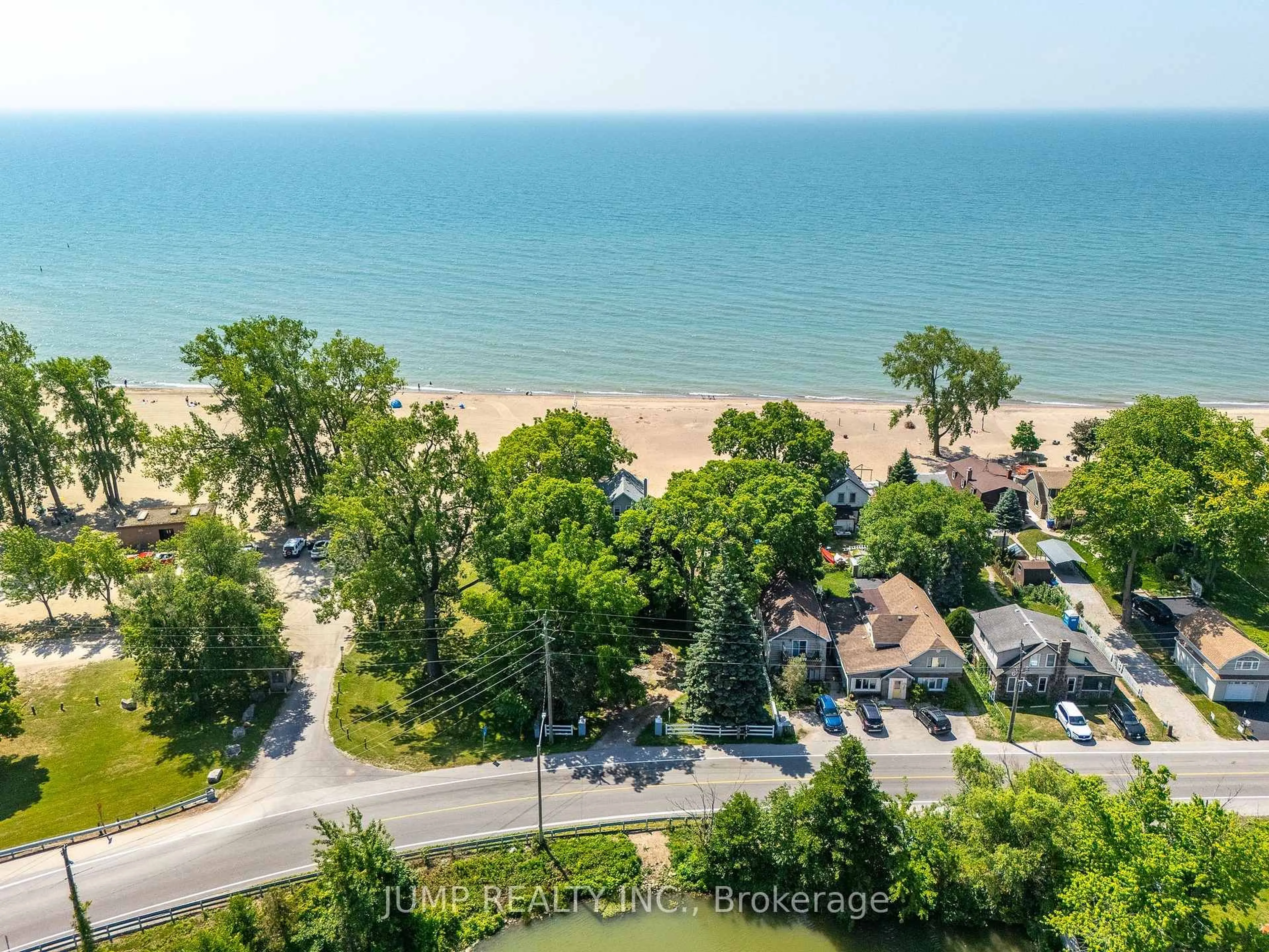 A pic from outside/outdoor area/front of a property/back of a property/a pic from drone, water/lake/river/ocean view for 1031 Heritage Rd, Kingsville Ontario N9Y 2E6
