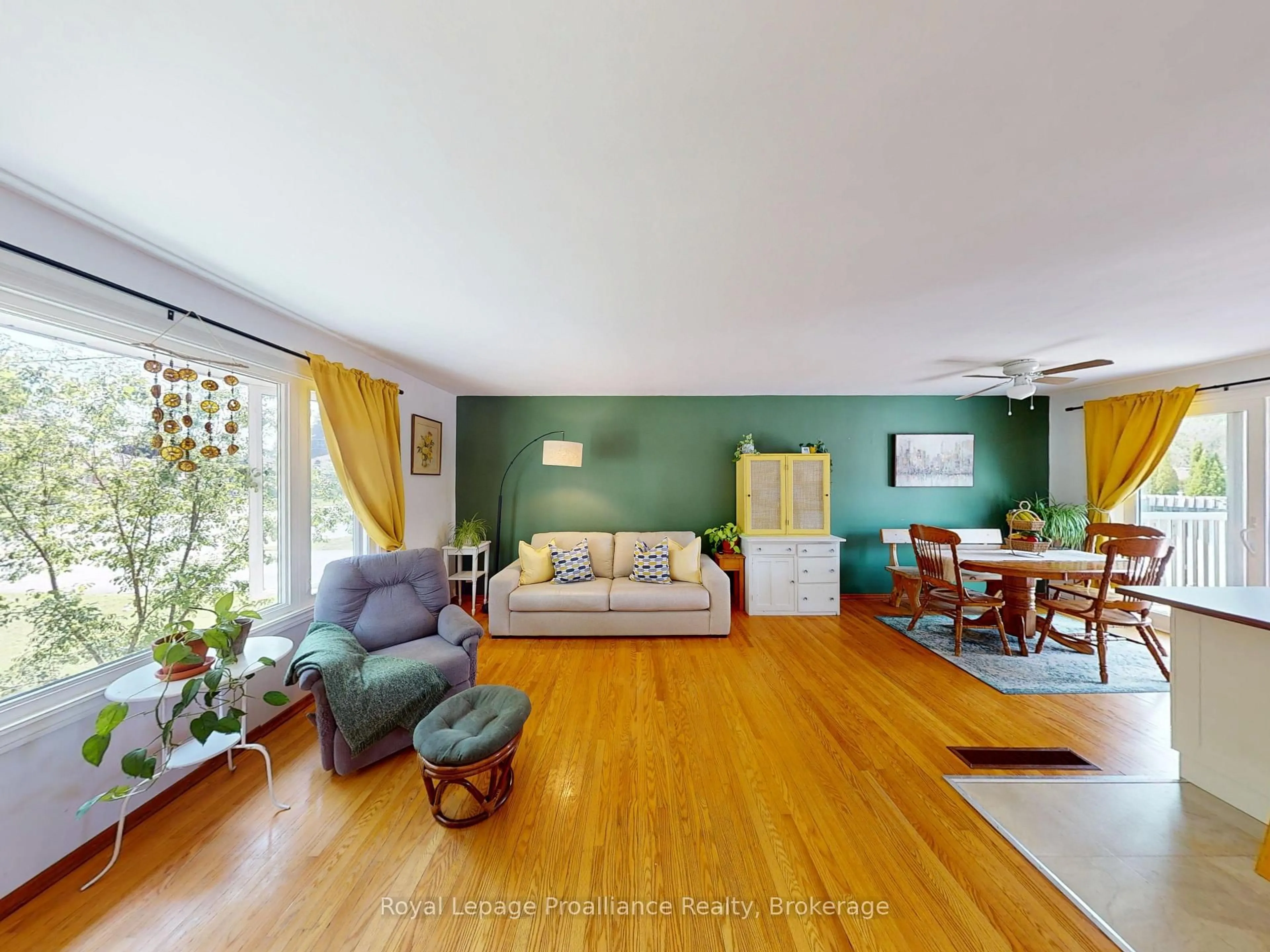 Living room with furniture, wood/laminate floor for 4 Richmond Grve, Belleville Ontario K8N 1Z1