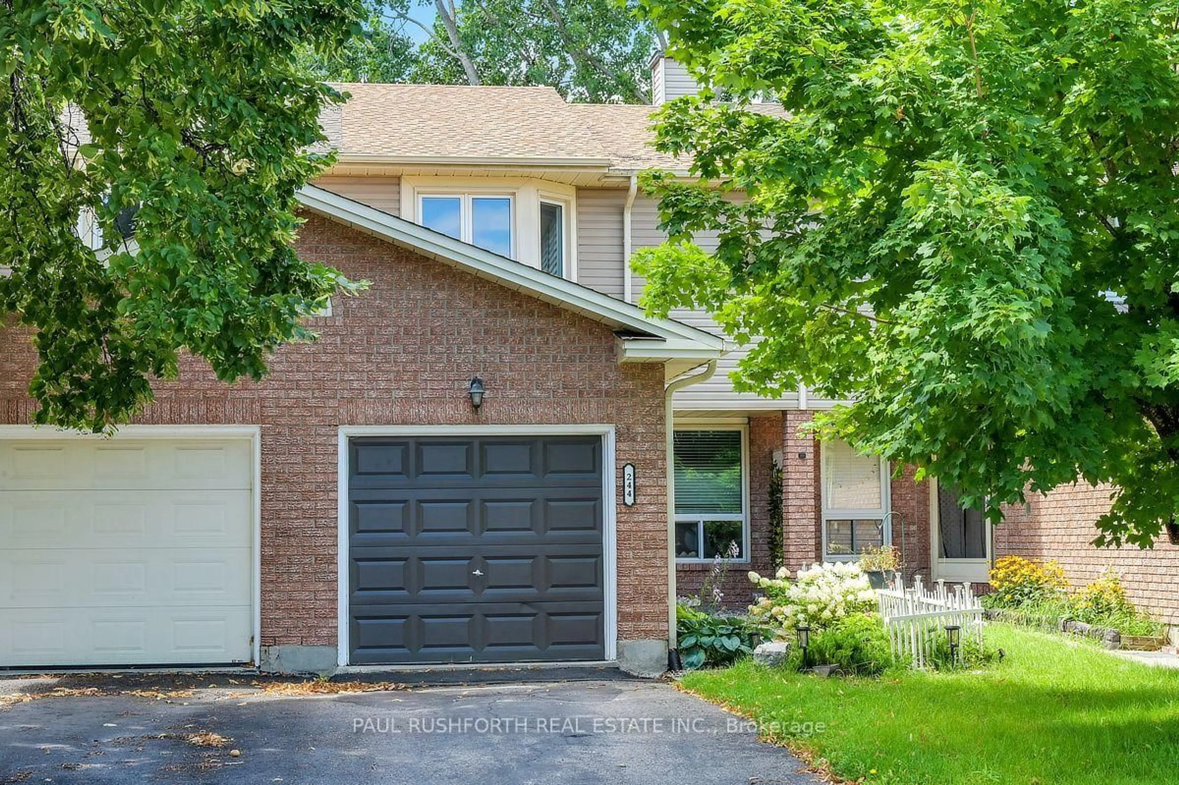 Home with brick exterior material, street for 244 Huntersfield Dr, Ottawa Ontario K1T 3M5