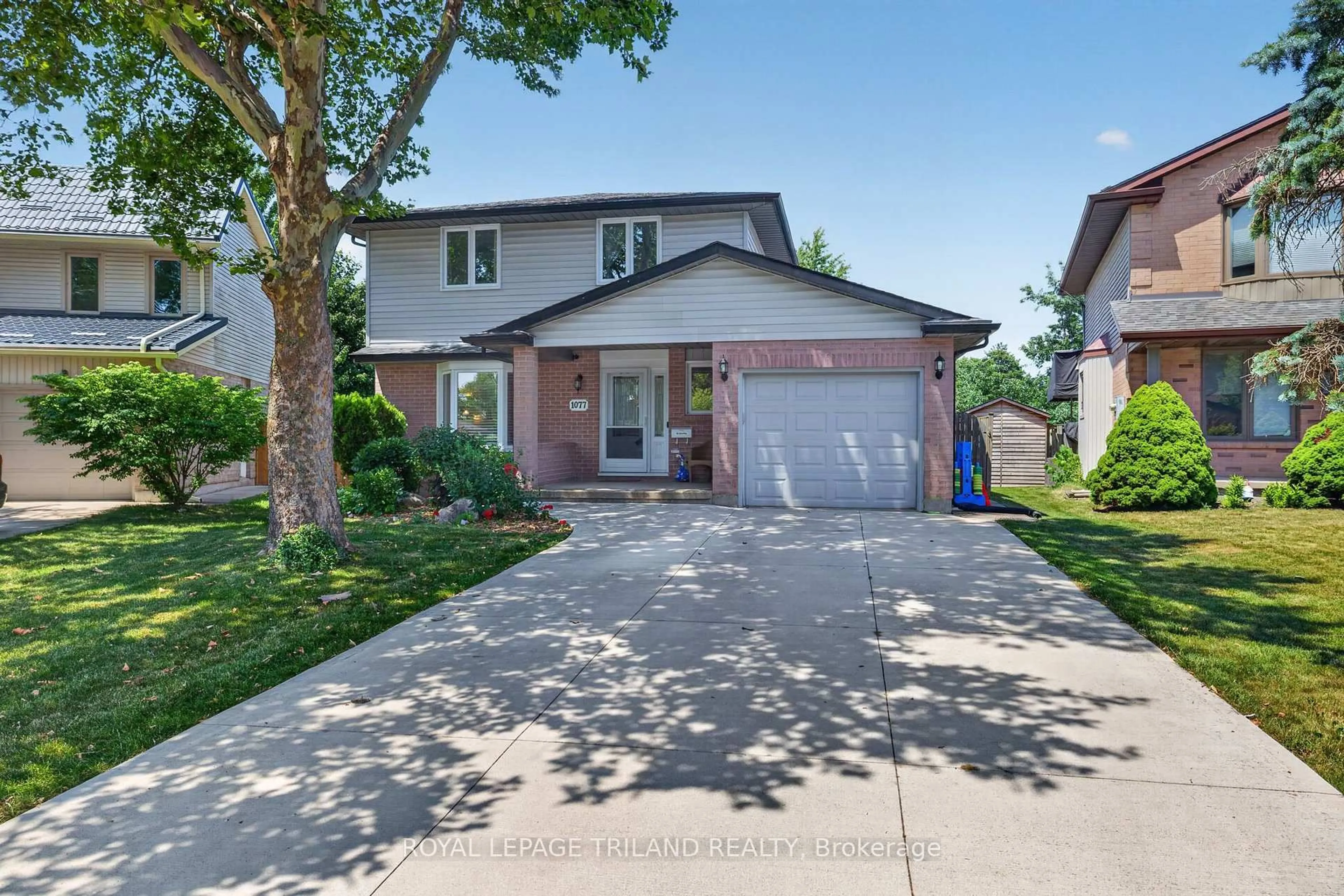 Home with brick exterior material, street for 1077 MAHOGANY Cres, London North Ontario N6H 4V8