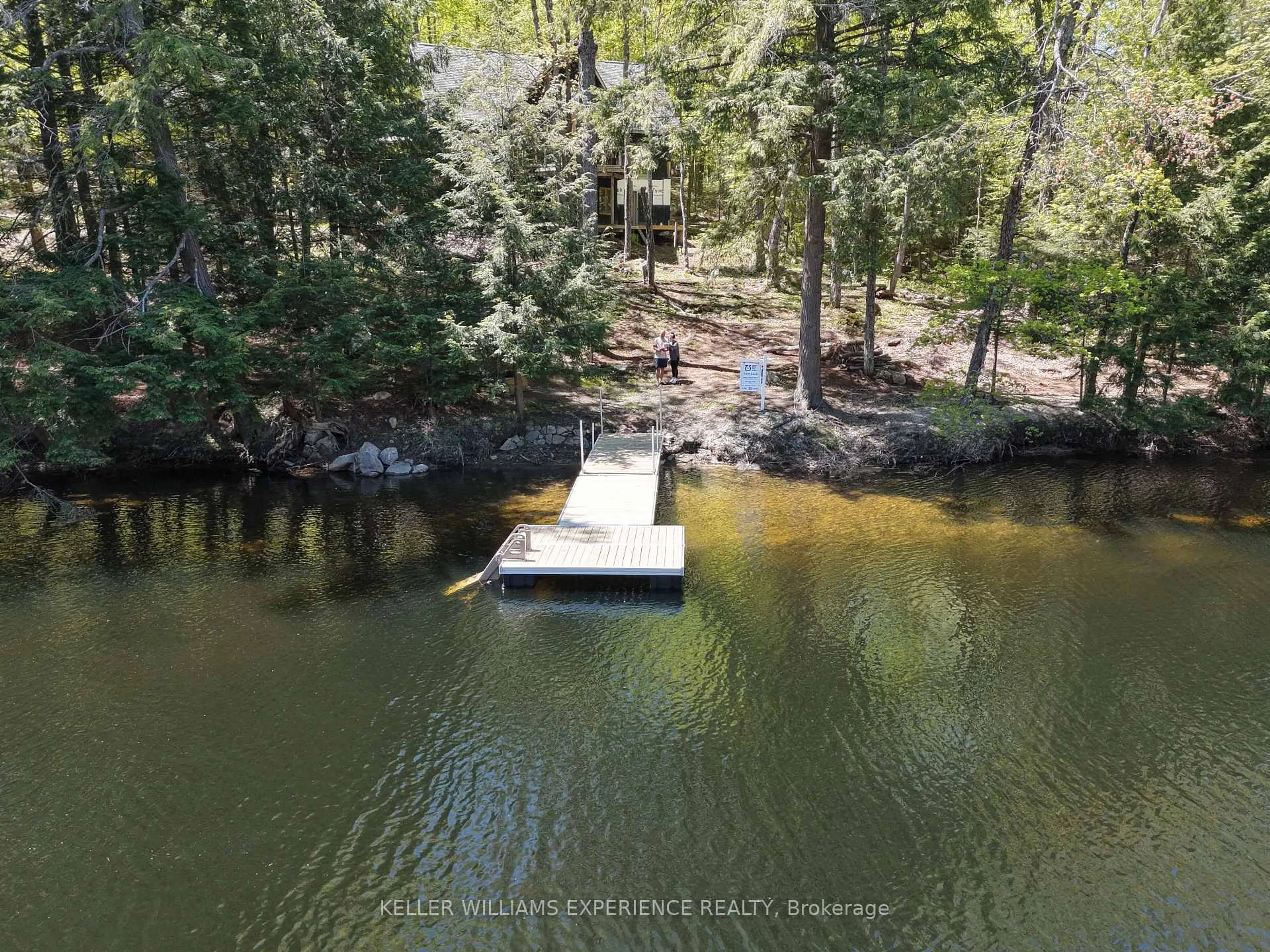 A pic from outside/outdoor area/front of a property/back of a property/a pic from drone, water/lake/river/ocean view for 1115 Sherwood Forest Rd, Bracebridge Ontario P1L 1X3
