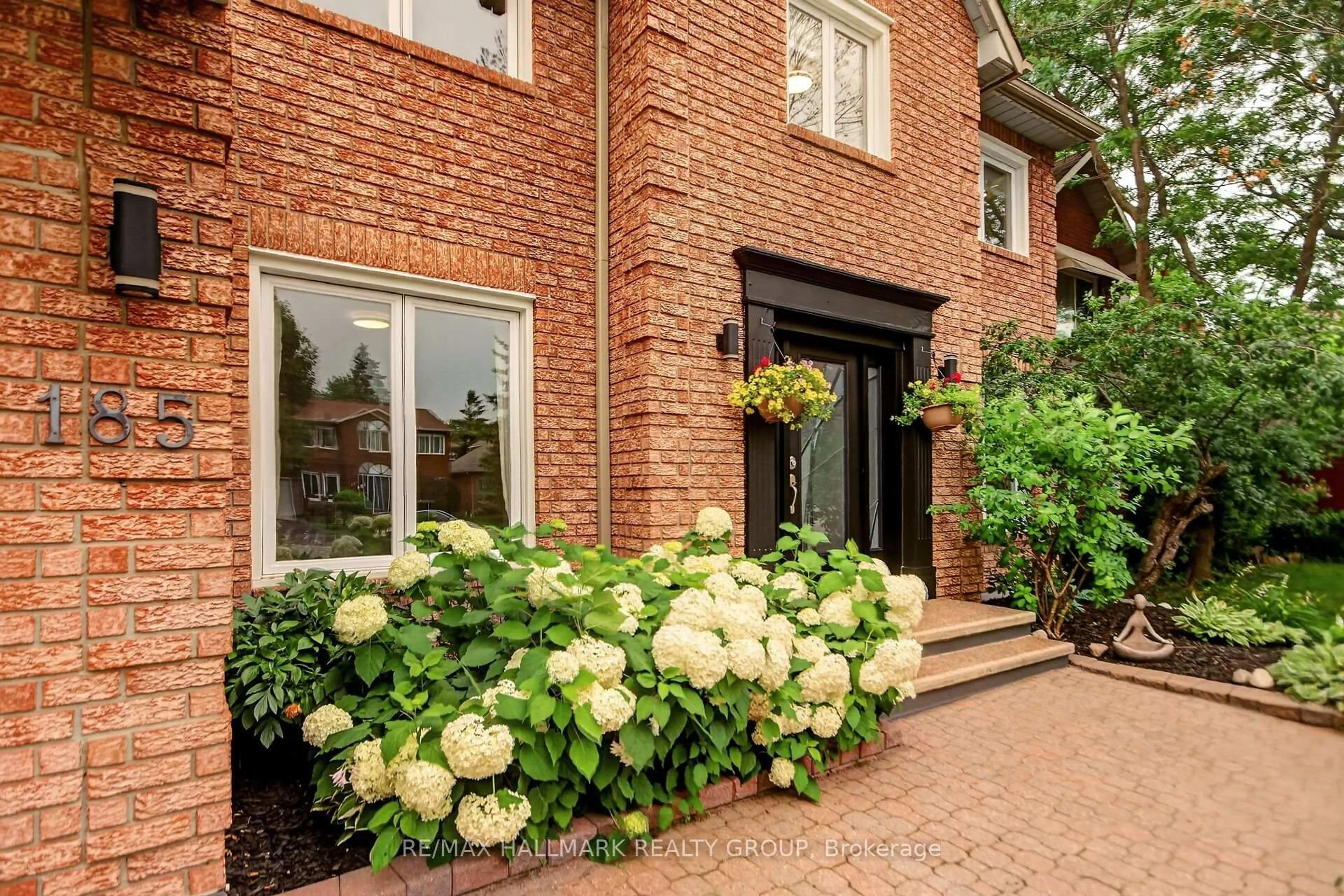 Home with brick exterior material, street for 185 Knudson Dr, Kanata Ontario K2K 2C3