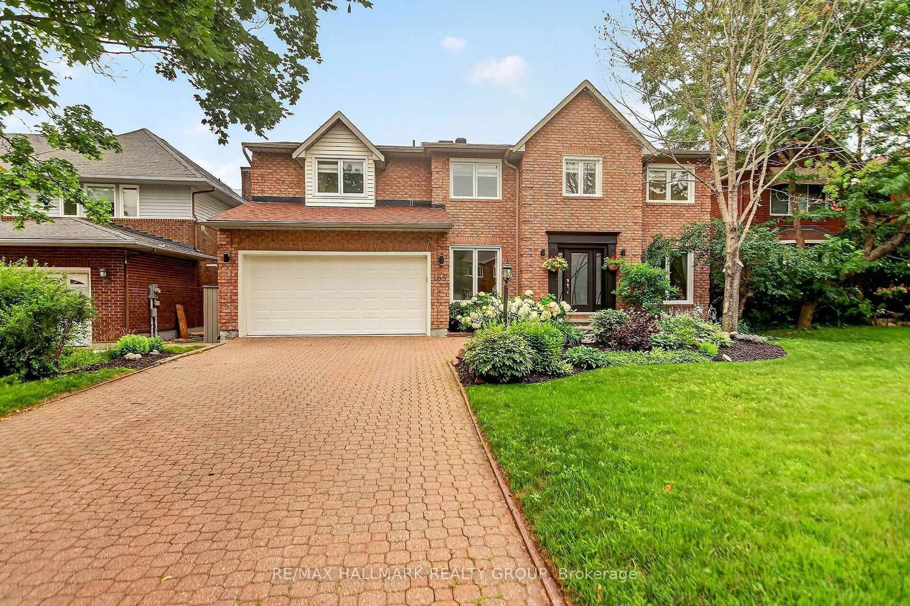 Home with brick exterior material, street for 185 Knudson Dr, Kanata Ontario K2K 2C3
