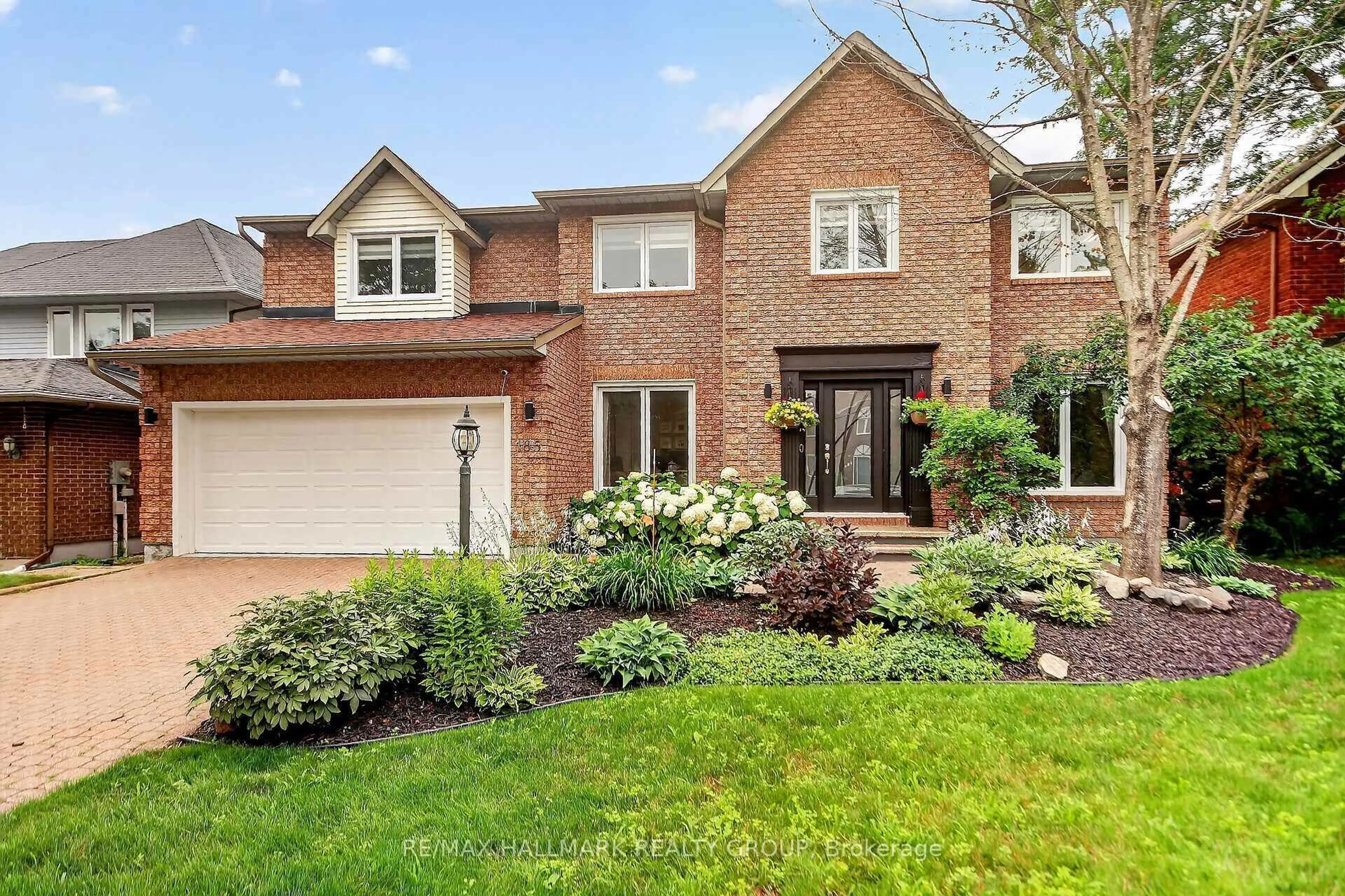 Home with brick exterior material, street for 185 Knudson Dr, Kanata Ontario K2K 2C3
