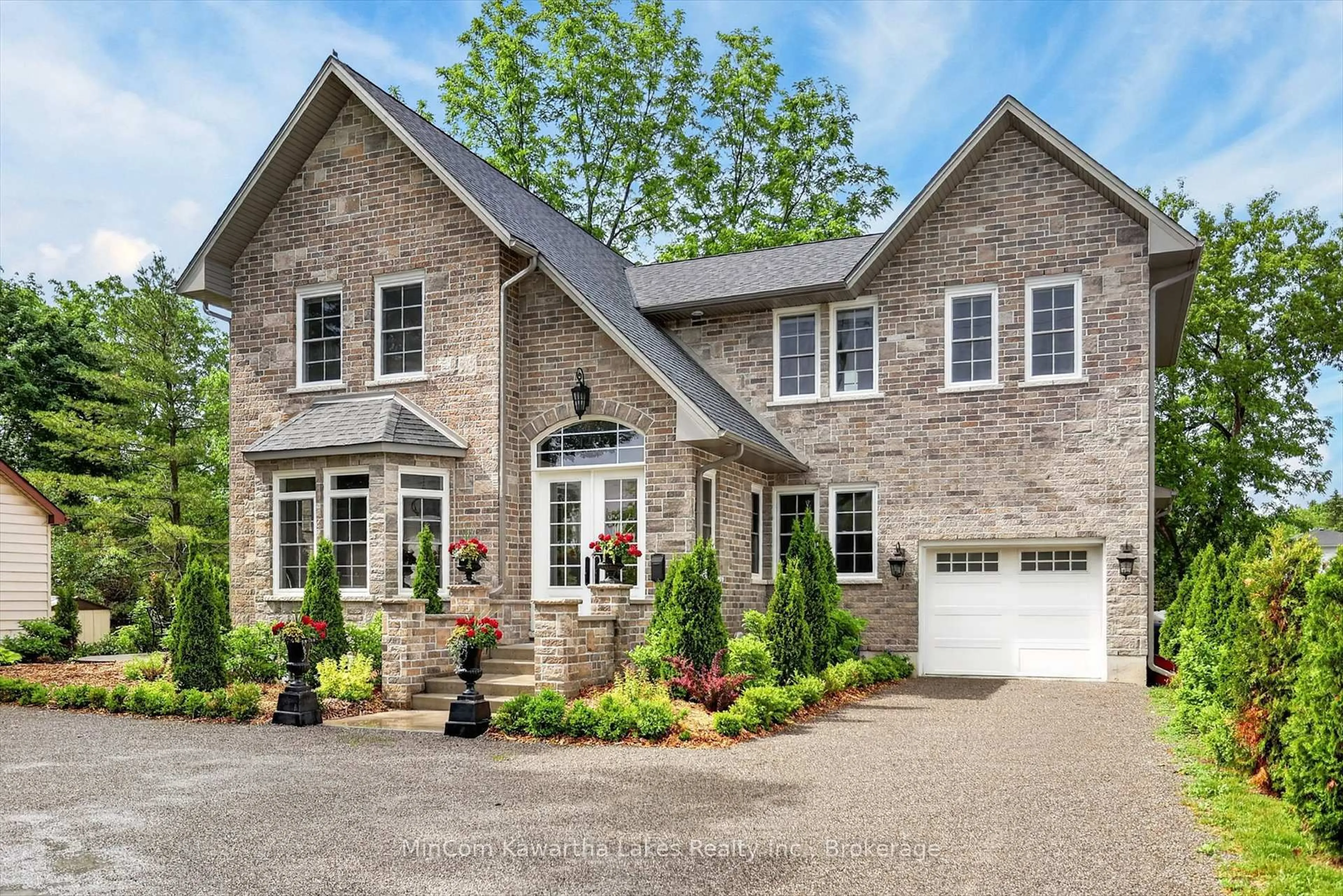Home with brick exterior material, street for 126 Maria St, Peterborough Ontario K9H 1B9