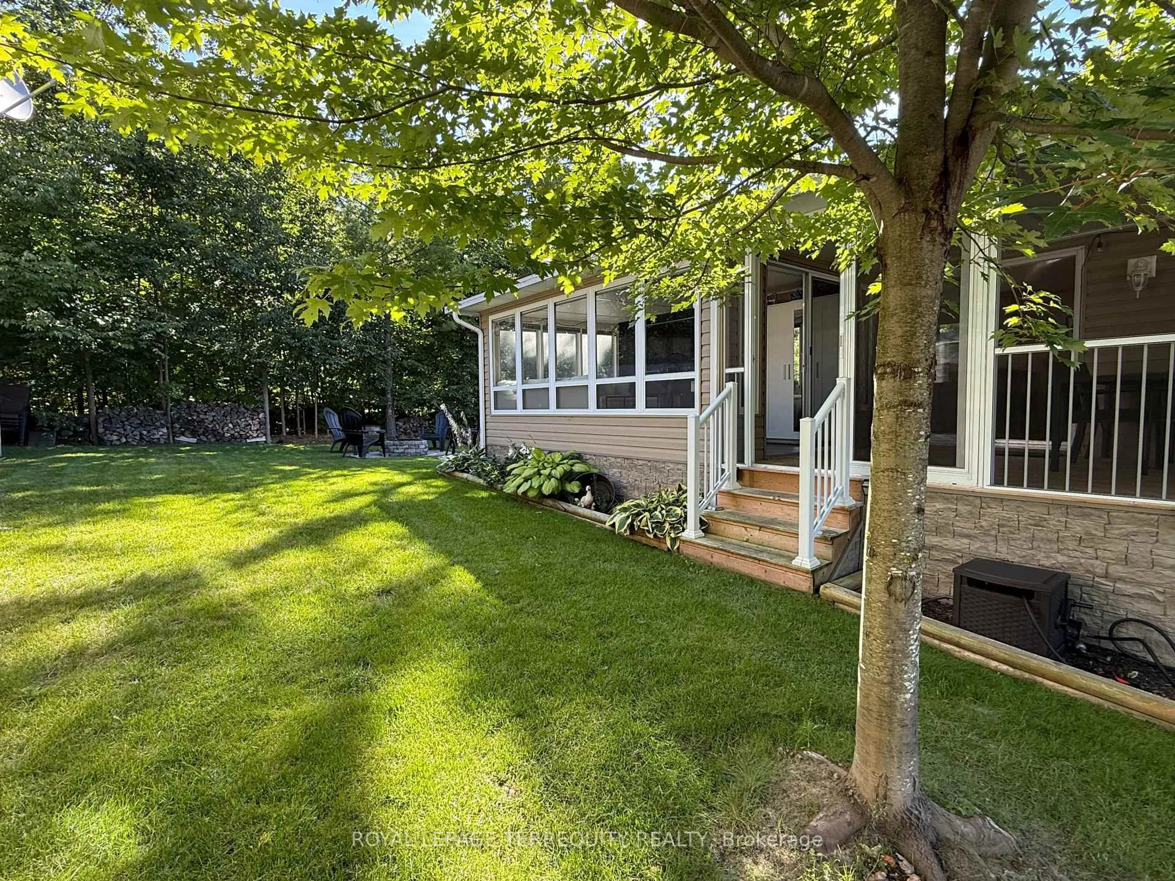 Patio, forest/trees view for 342 Butternut, Selwyn Ontario K0L 2H0