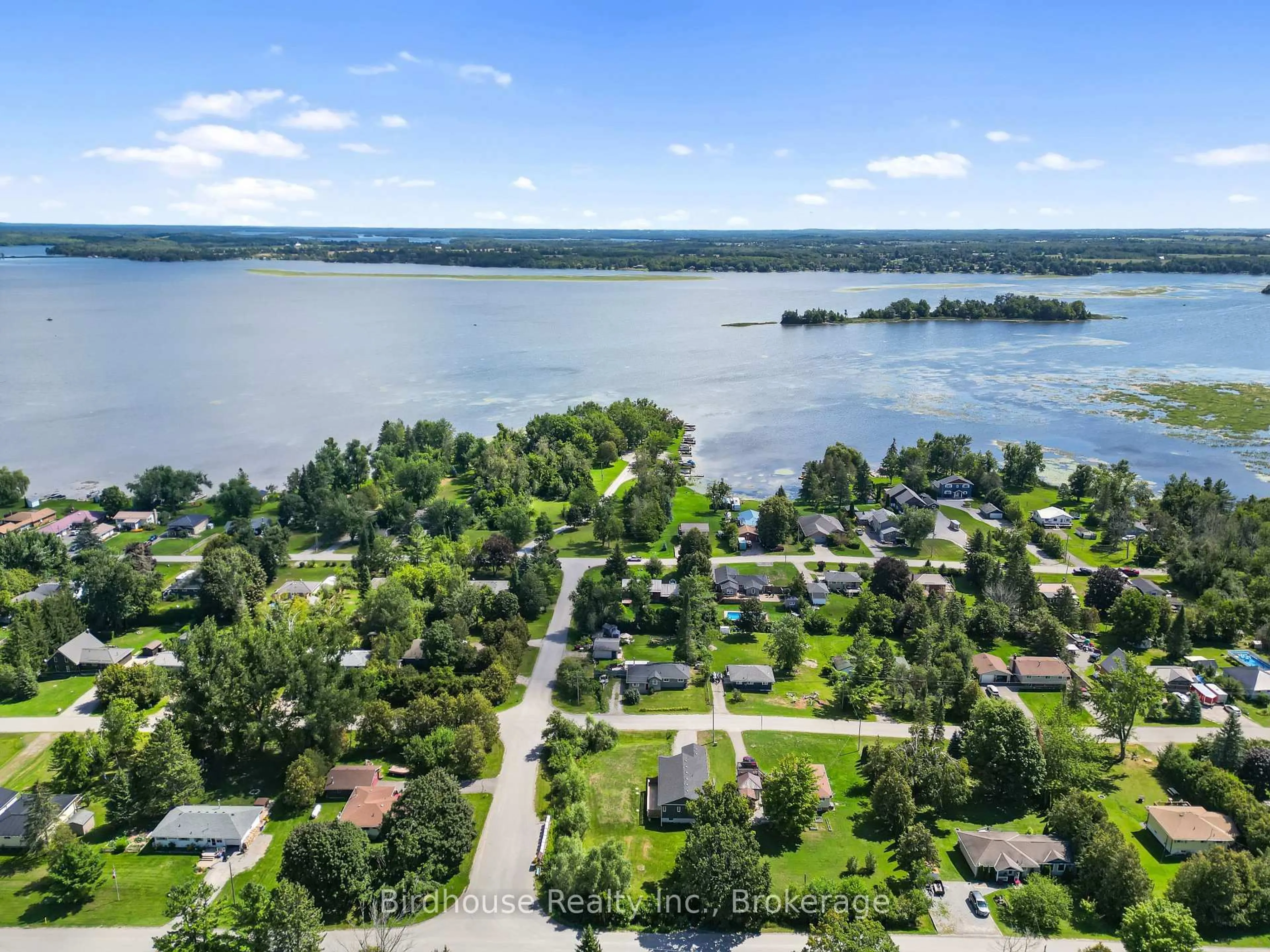 A pic from outside/outdoor area/front of a property/back of a property/a pic from drone, water/lake/river/ocean view for 223 Crosby Dr, Kawartha Lakes Ontario K0M 1A0