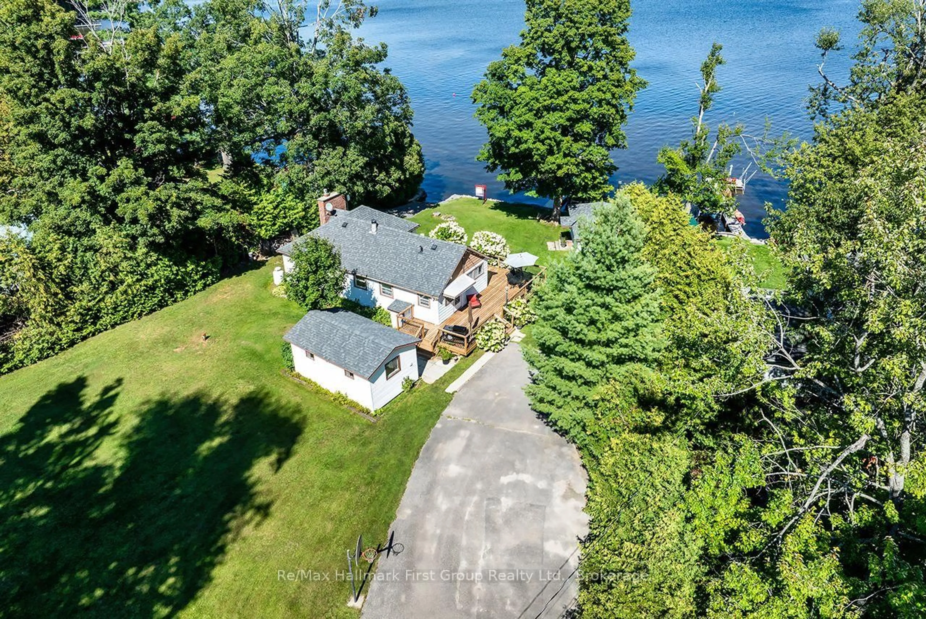 A pic from outside/outdoor area/front of a property/back of a property/a pic from drone, water/lake/river/ocean view for 210 Wrenhaven Rd, Kawartha Lakes Ontario K0M 1N0