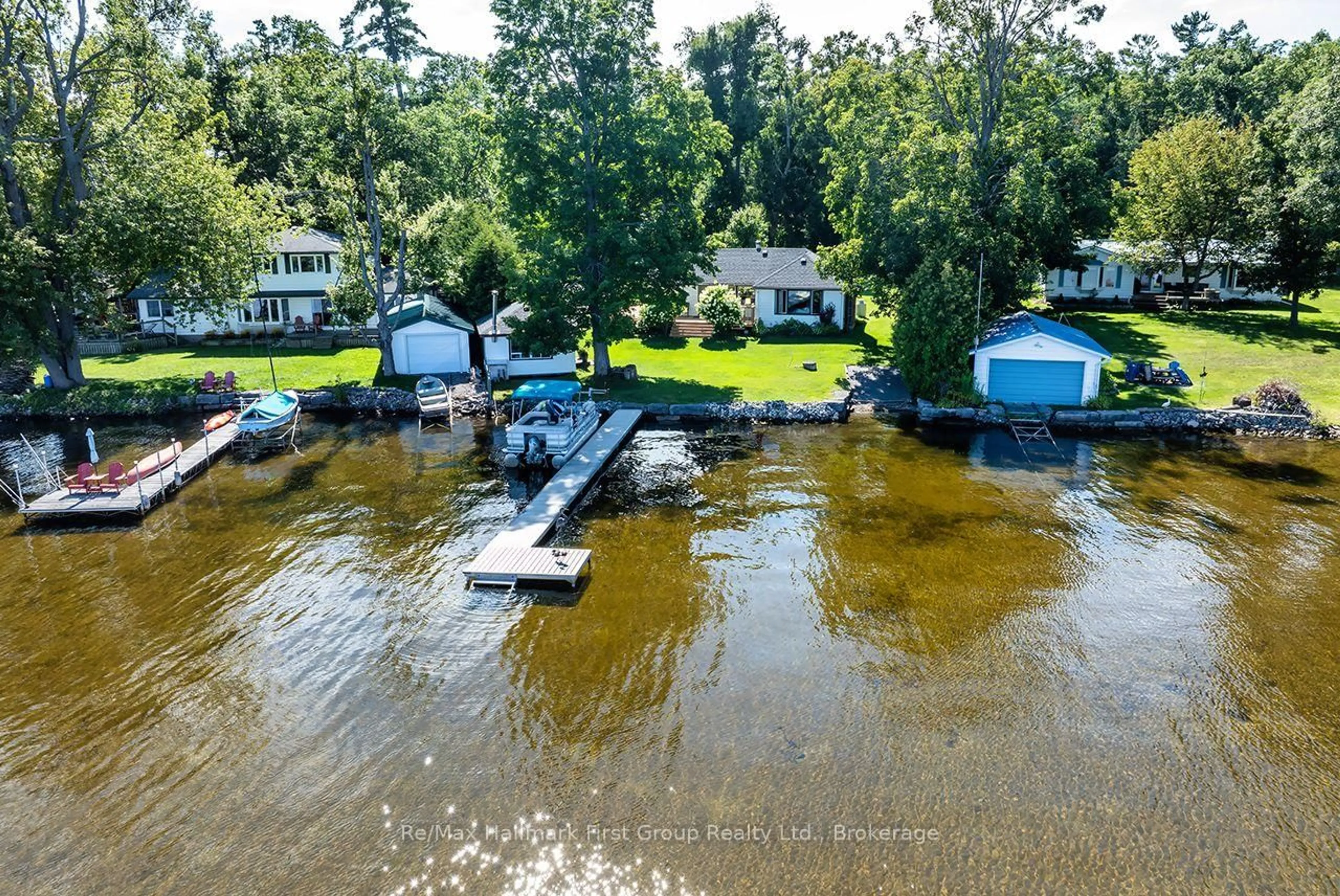 A pic from outside/outdoor area/front of a property/back of a property/a pic from drone, water/lake/river/ocean view for 210 Wrenhaven Rd, Kawartha Lakes Ontario K0M 1N0