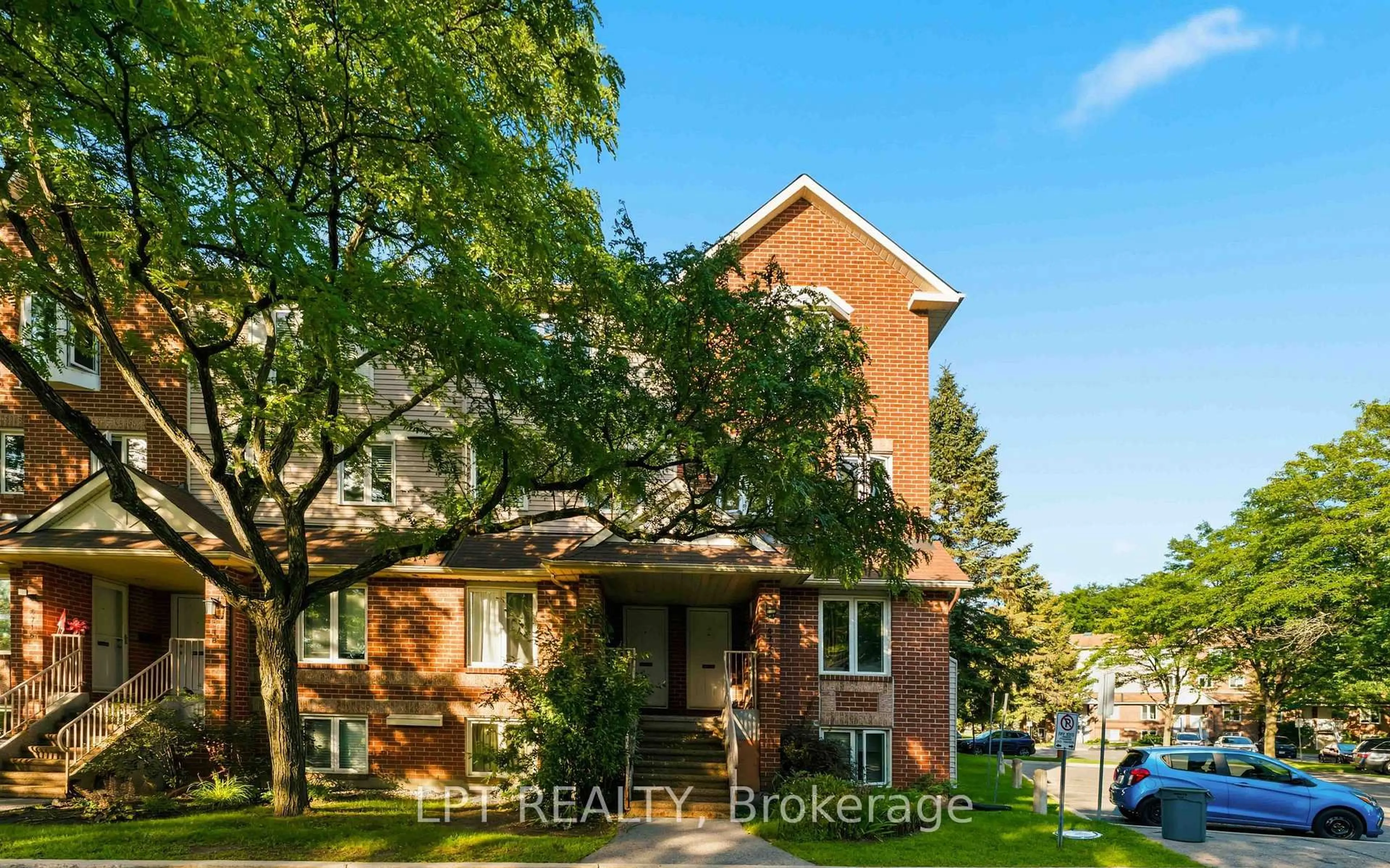 Home with brick exterior material, street for 6722 Jeanne d'Arc Blvd #B, Ottawa Ontario K1C 6E9