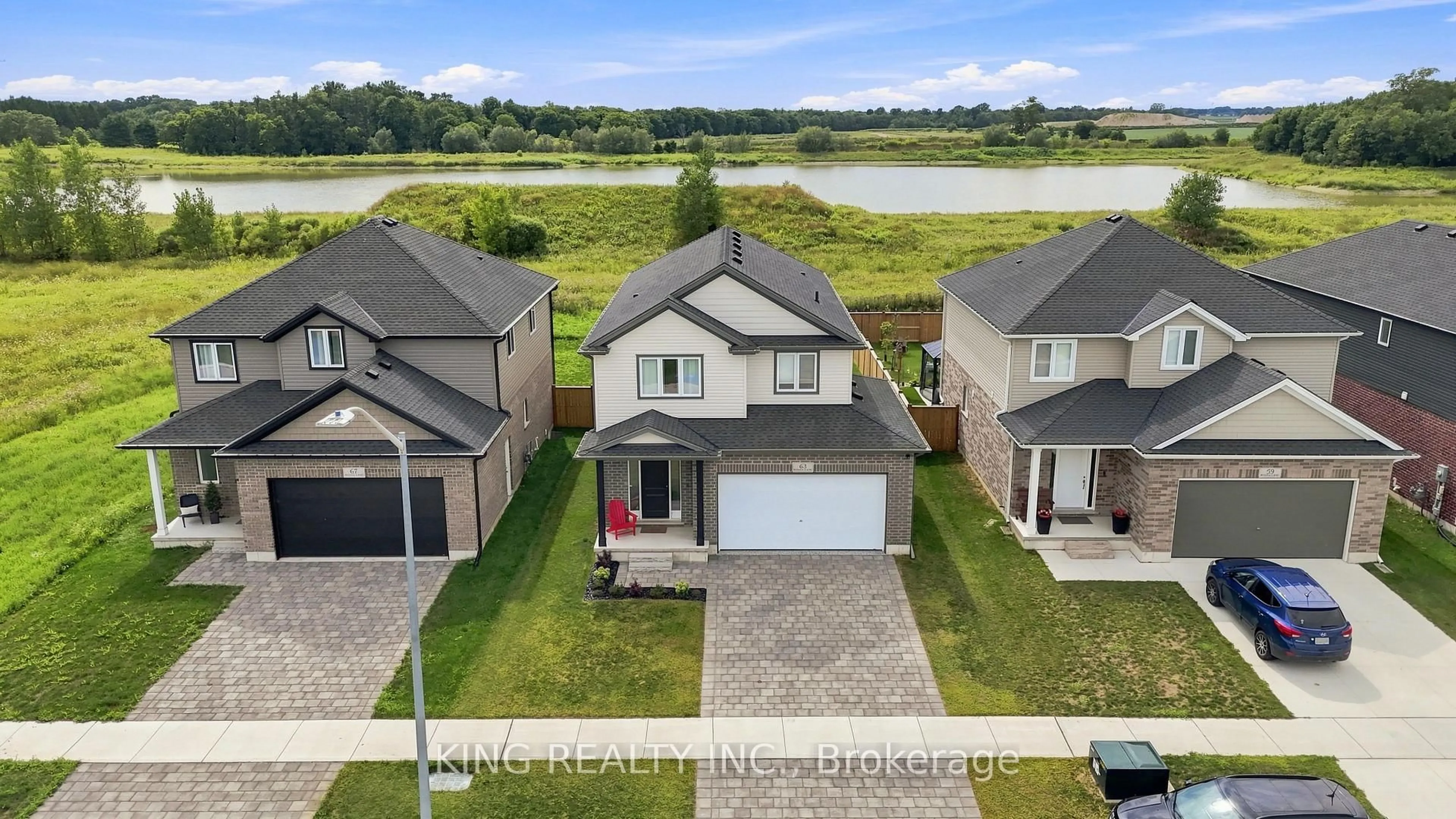 A pic from outside/outdoor area/front of a property/back of a property/a pic from drone, water/lake/river/ocean view for 63 Rosina Lane, Zorra Ontario N0M 2M0