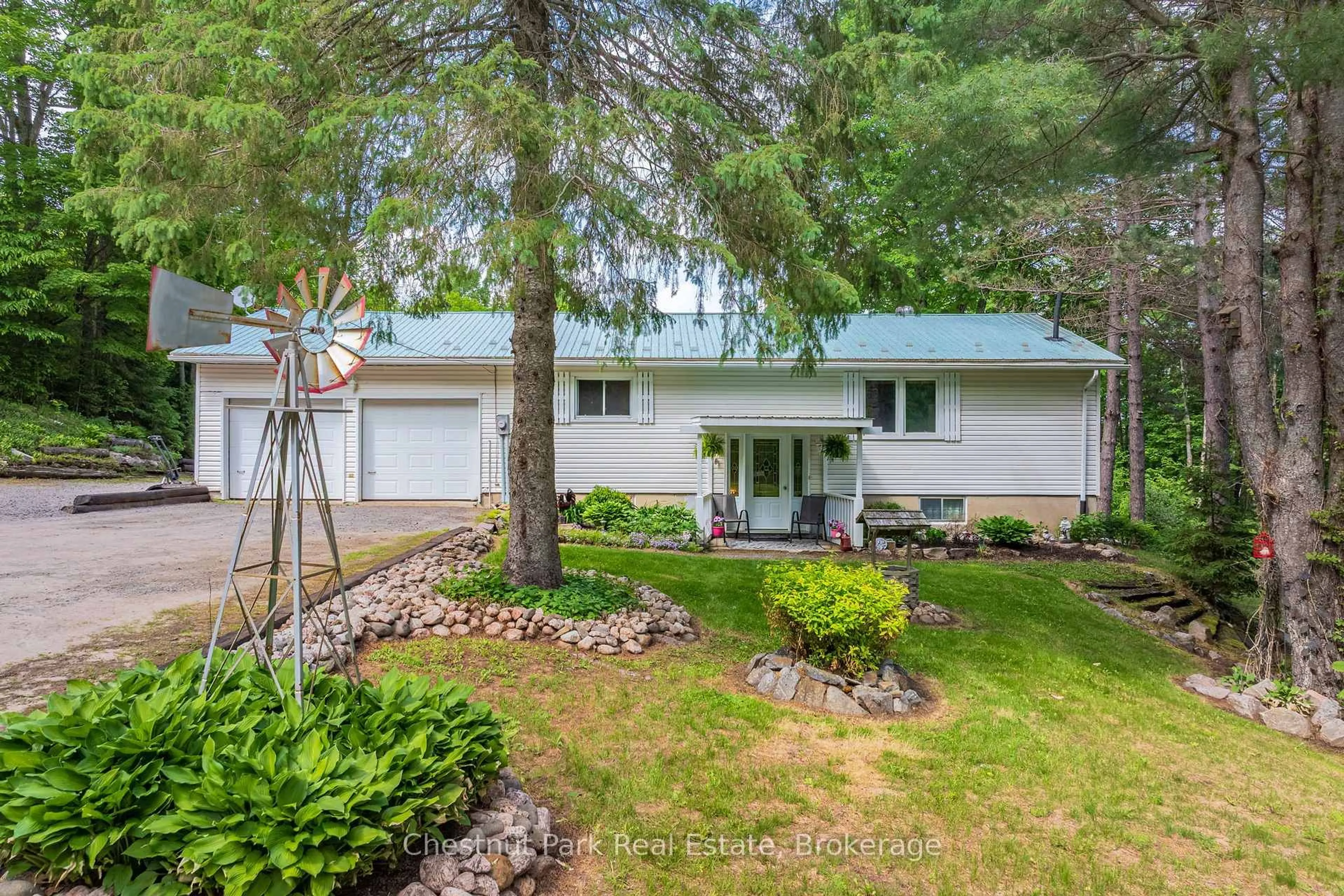 A pic from outside/outdoor area/front of a property/back of a property/a pic from drone, unknown for 379 Gables Rd, Machar Ontario P0A 1X0