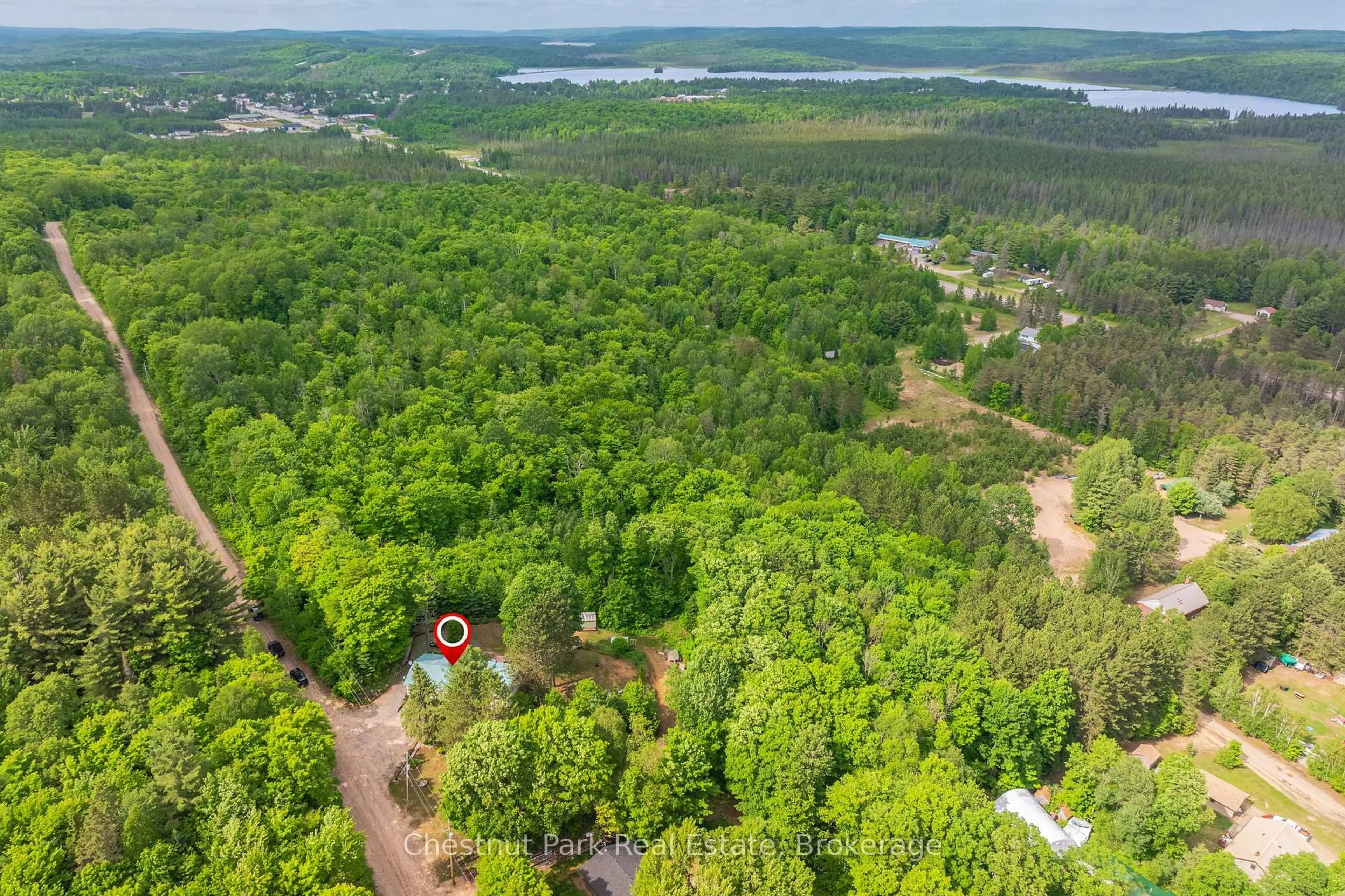 A pic from outside/outdoor area/front of a property/back of a property/a pic from drone, forest/trees view for 379 Gables Rd, Machar Ontario P0A 1X0
