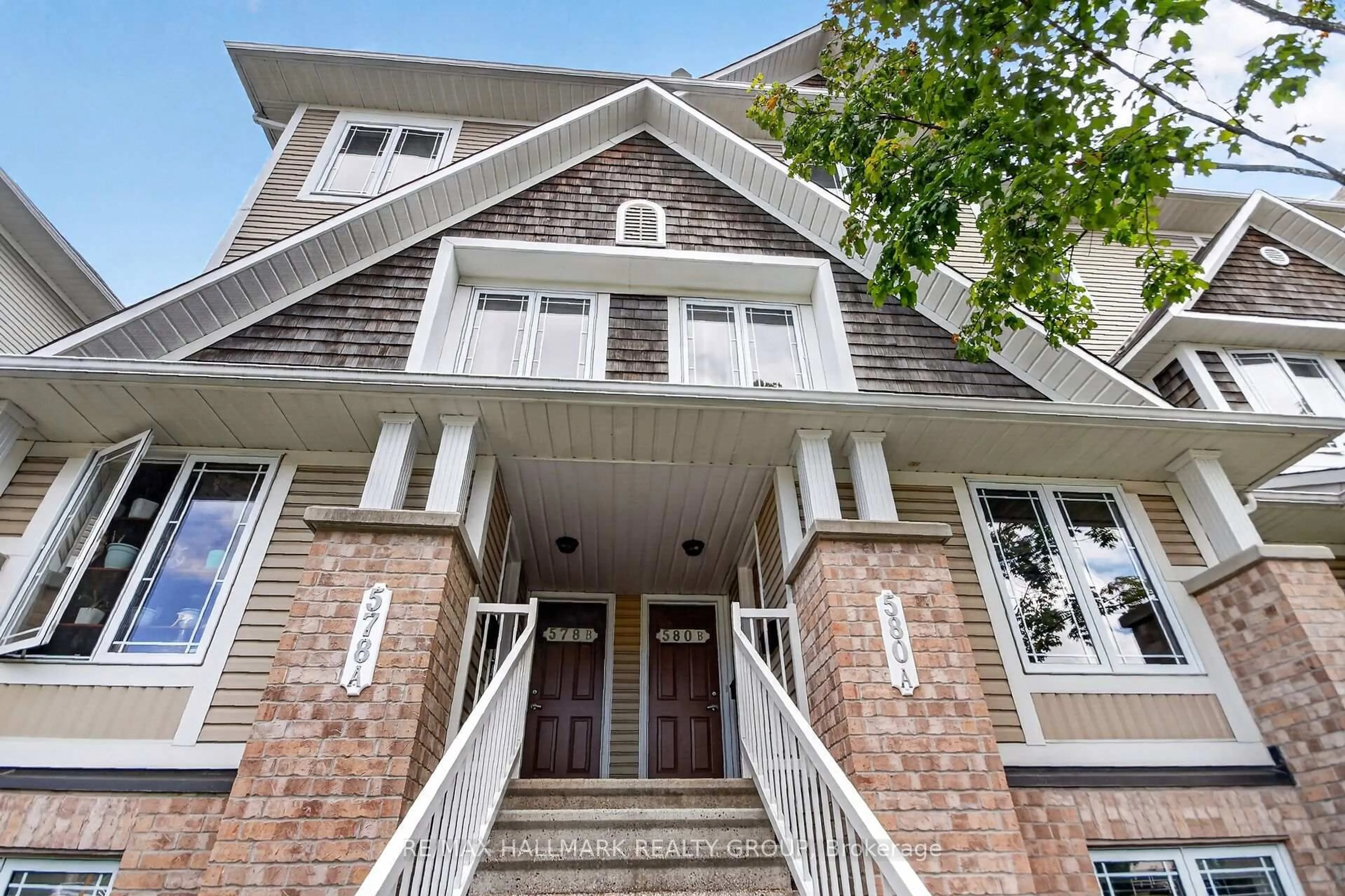Home with brick exterior material, street for 580A Chapman Mills Dr, Ottawa Ontario K2J 3V2