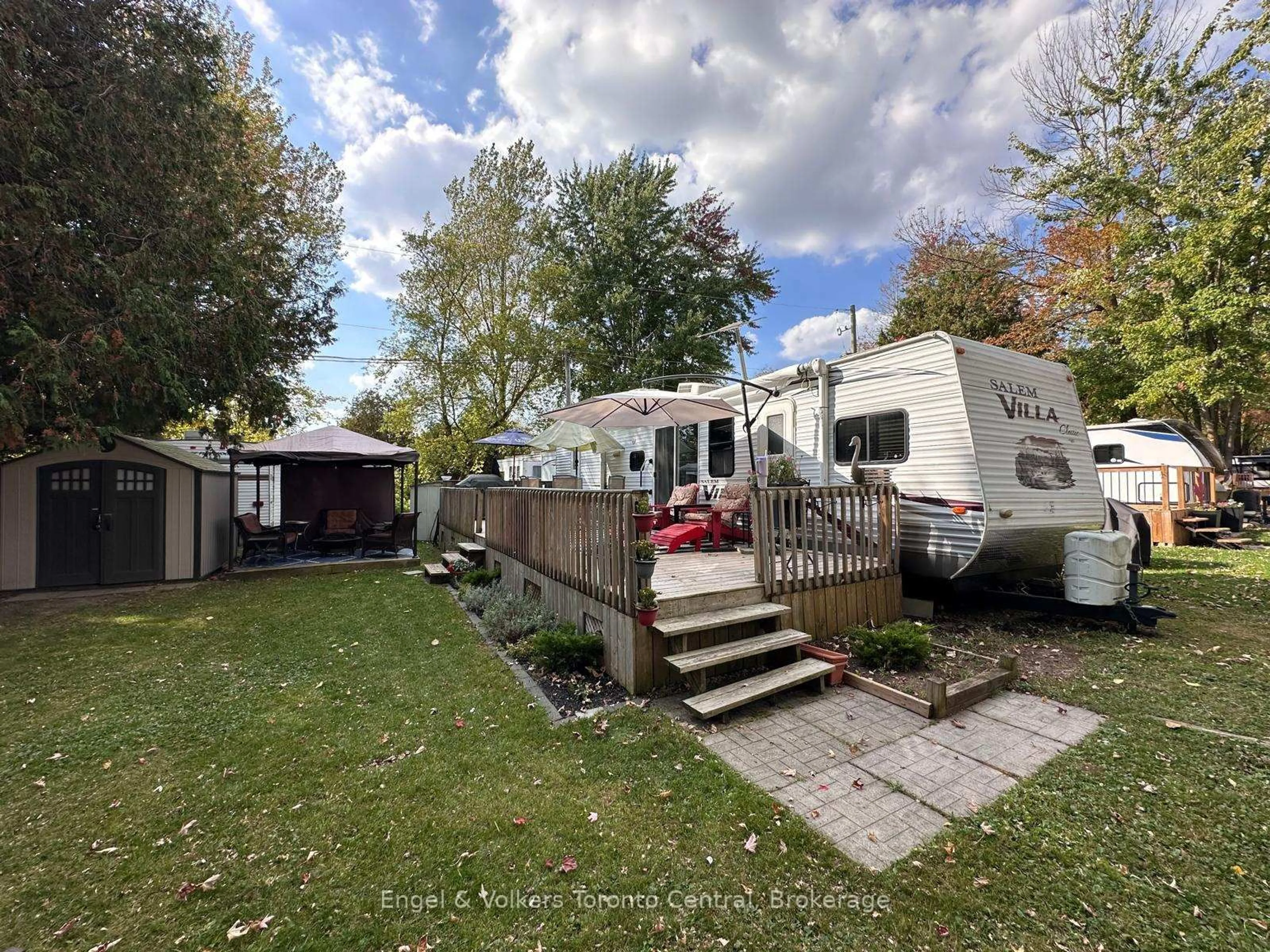 A pic from outside/outdoor area/front of a property/back of a property/a pic from drone, street for 7489 SIDEROAD 5 E #S 8, Wellington North Ontario N0G 2L0