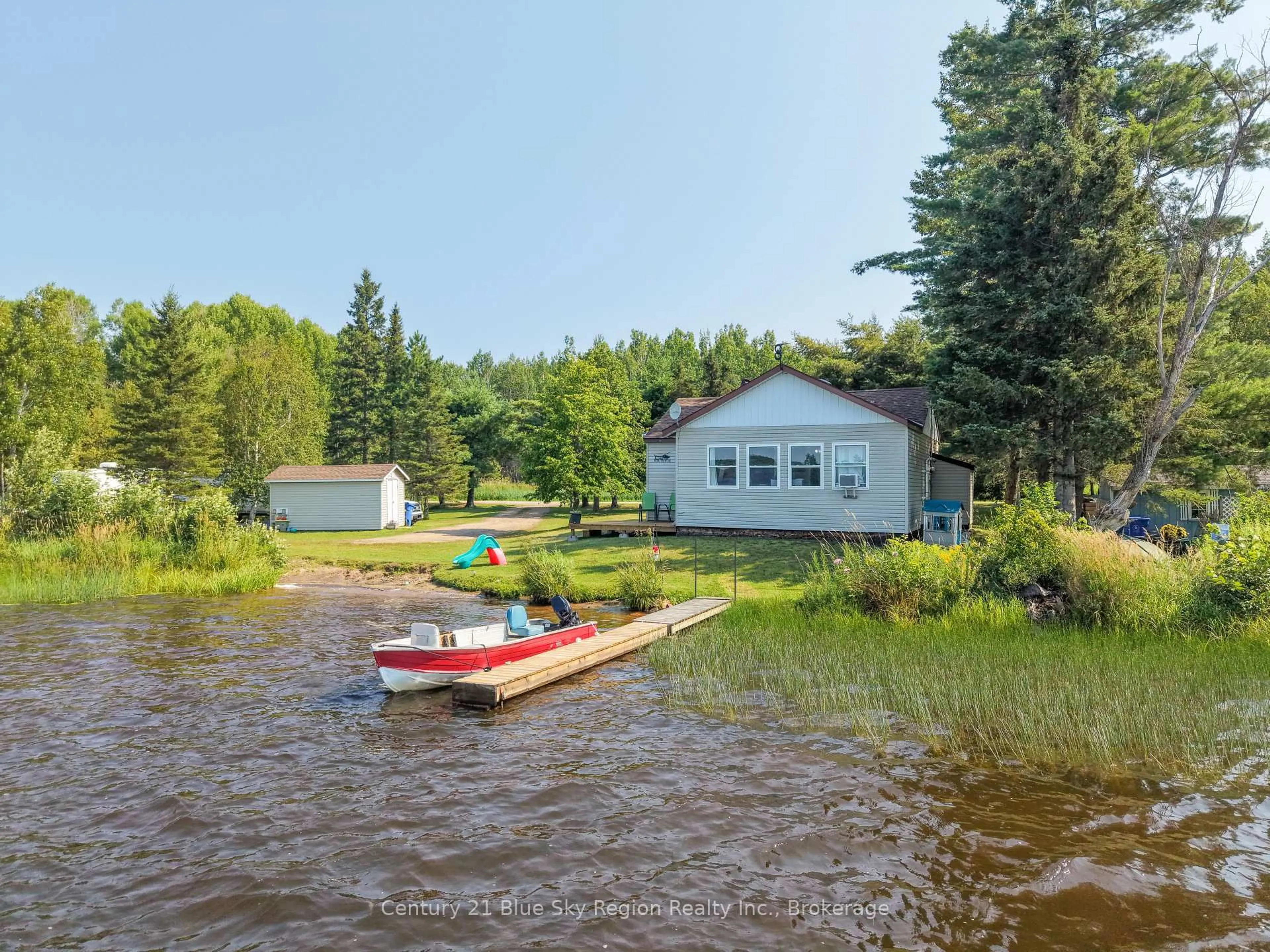 A pic from outside/outdoor area/front of a property/back of a property/a pic from drone, water/lake/river/ocean view for 86 Bayview Dr, Chisholm Ontario P0H 1Z0