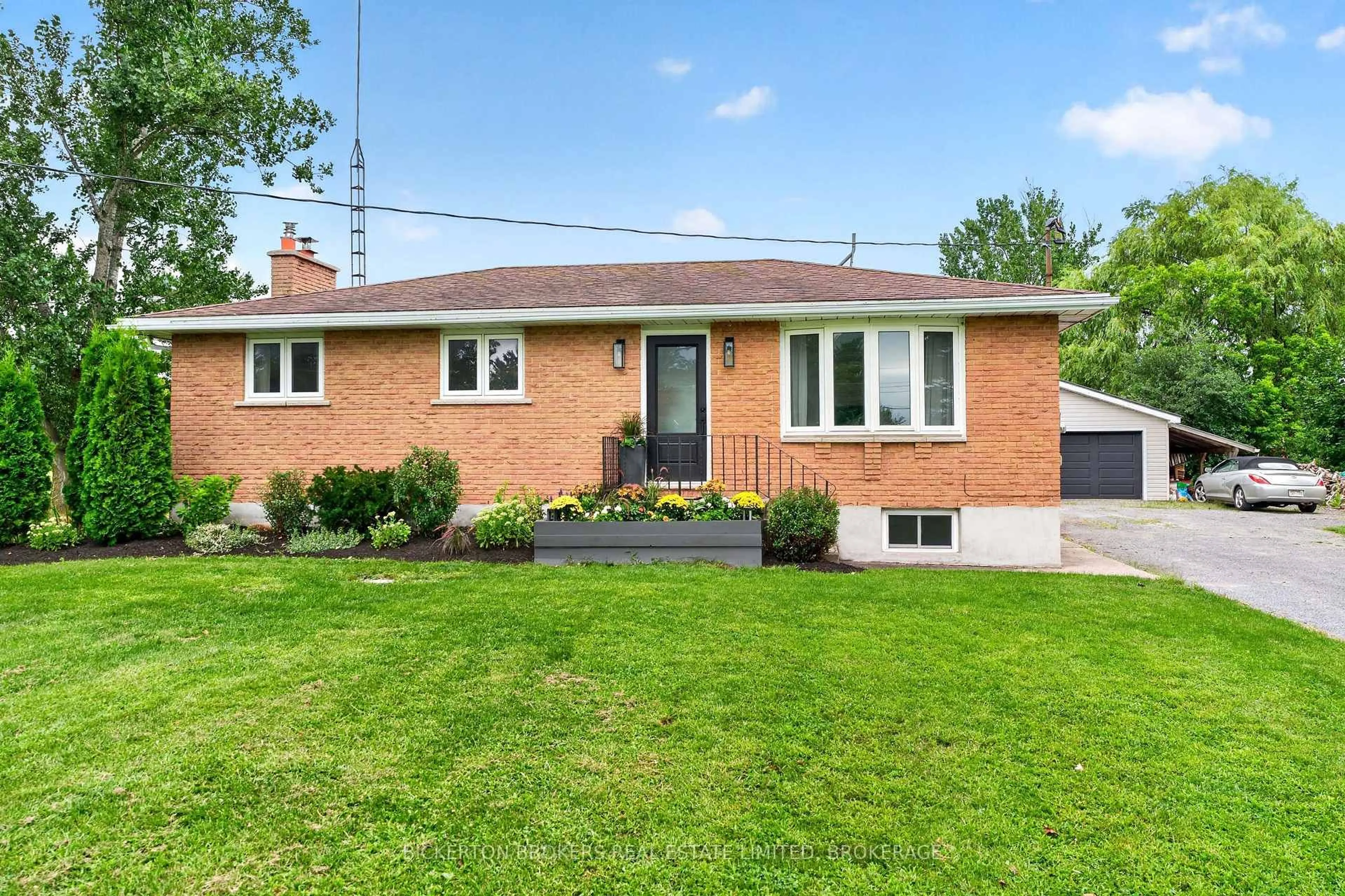 Home with brick exterior material, street for 62 Haig Rd, Front of Leeds & Seeleys Bay Ontario K7G 2V4