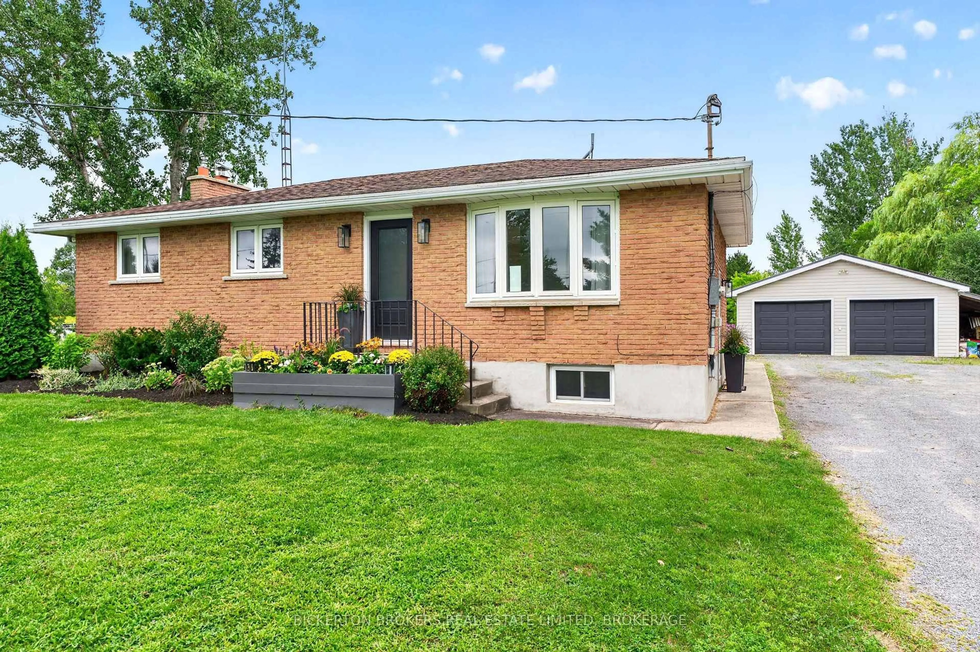 Home with brick exterior material, street for 62 Haig Rd, Front of Leeds & Seeleys Bay Ontario K7G 2V4