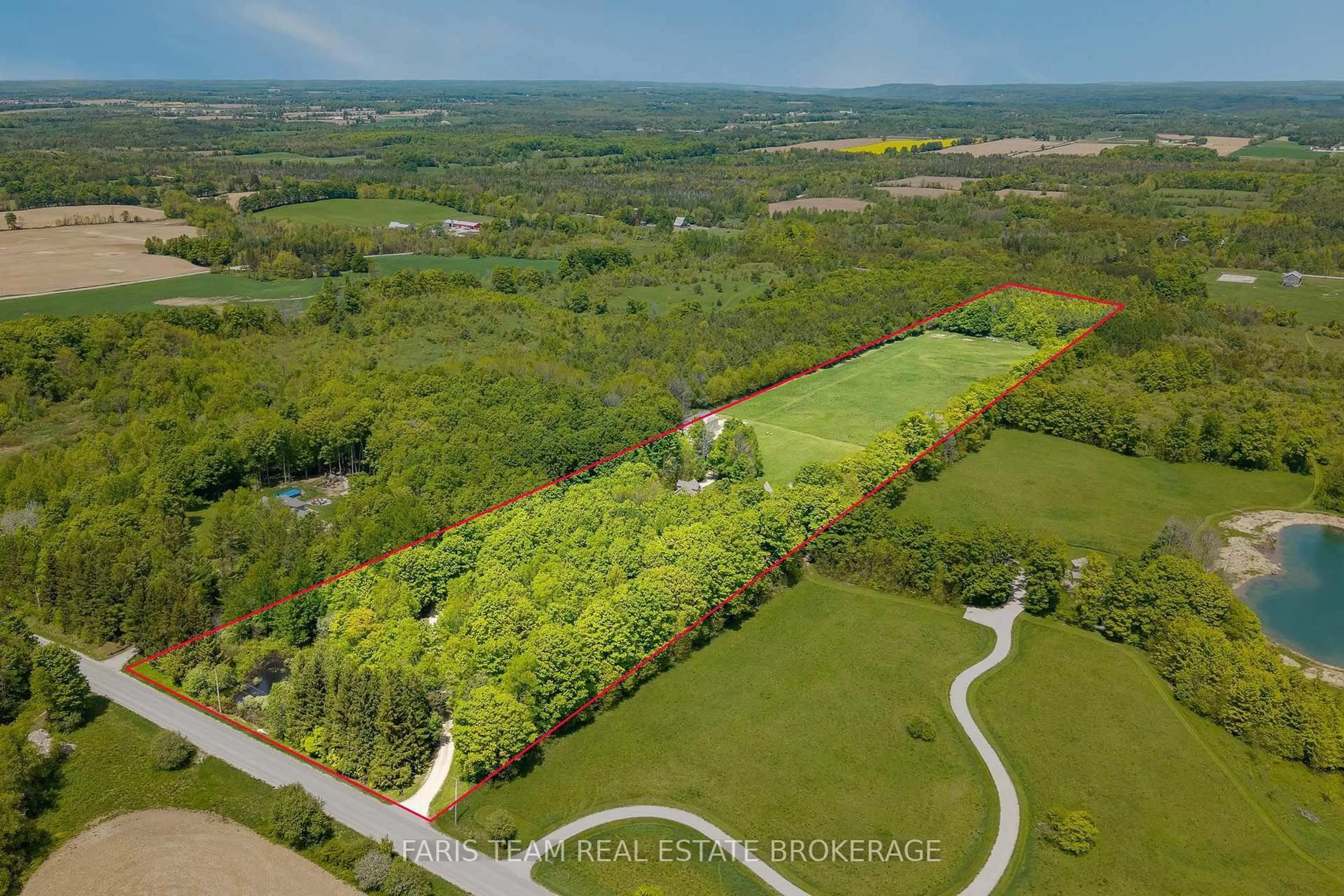 A pic from outside/outdoor area/front of a property/back of a property/a pic from drone, forest/trees view for 714329 Baseline Rd, Grey Highlands Ontario N0C 1E0