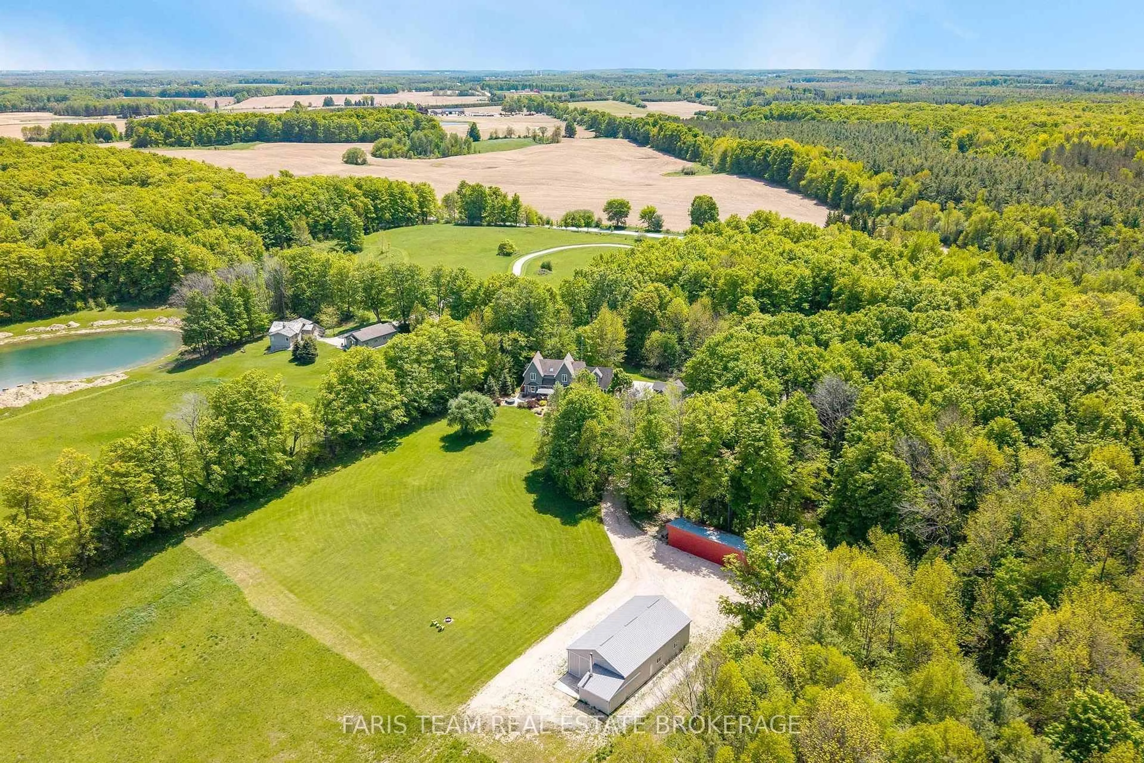 A pic from outside/outdoor area/front of a property/back of a property/a pic from drone, unknown for 714329 Baseline Rd, Grey Highlands Ontario N0C 1E0