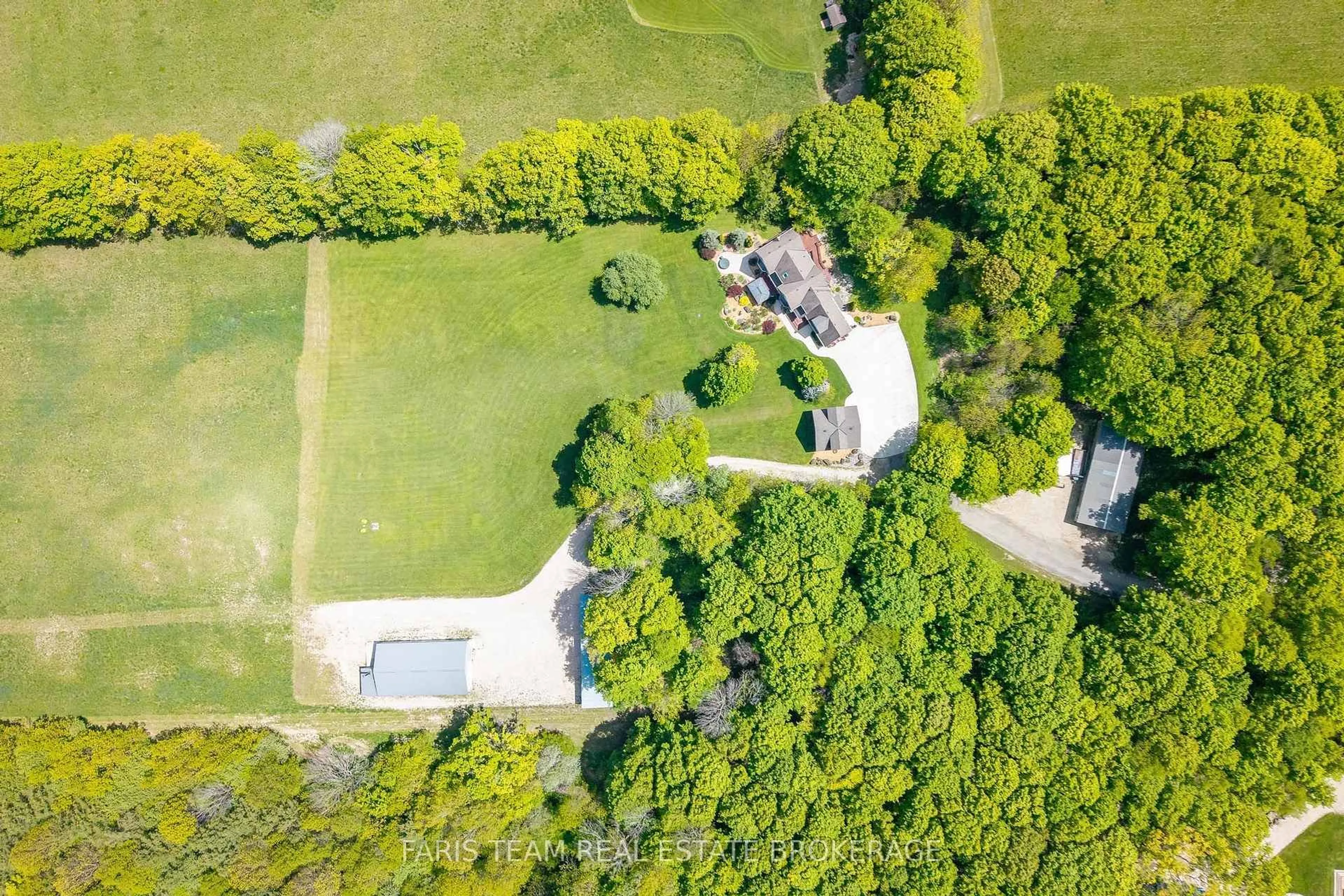 A pic from outside/outdoor area/front of a property/back of a property/a pic from drone, forest/trees view for 714329 Baseline Rd, Grey Highlands Ontario N0C 1E0