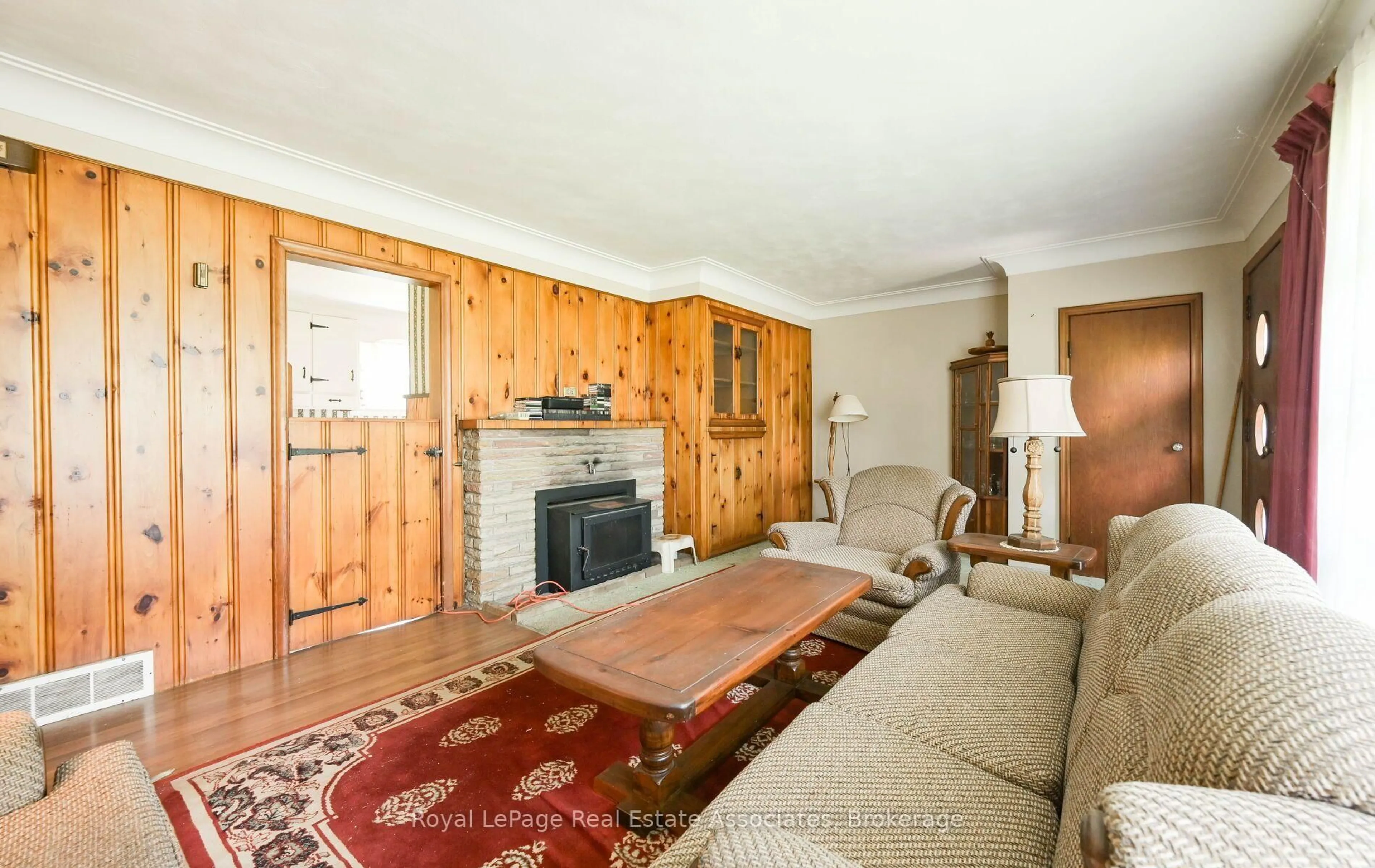 Living room with furniture, wood/laminate floor for 27 Rothsay Ave, Kitchener Ontario N2B 3A2