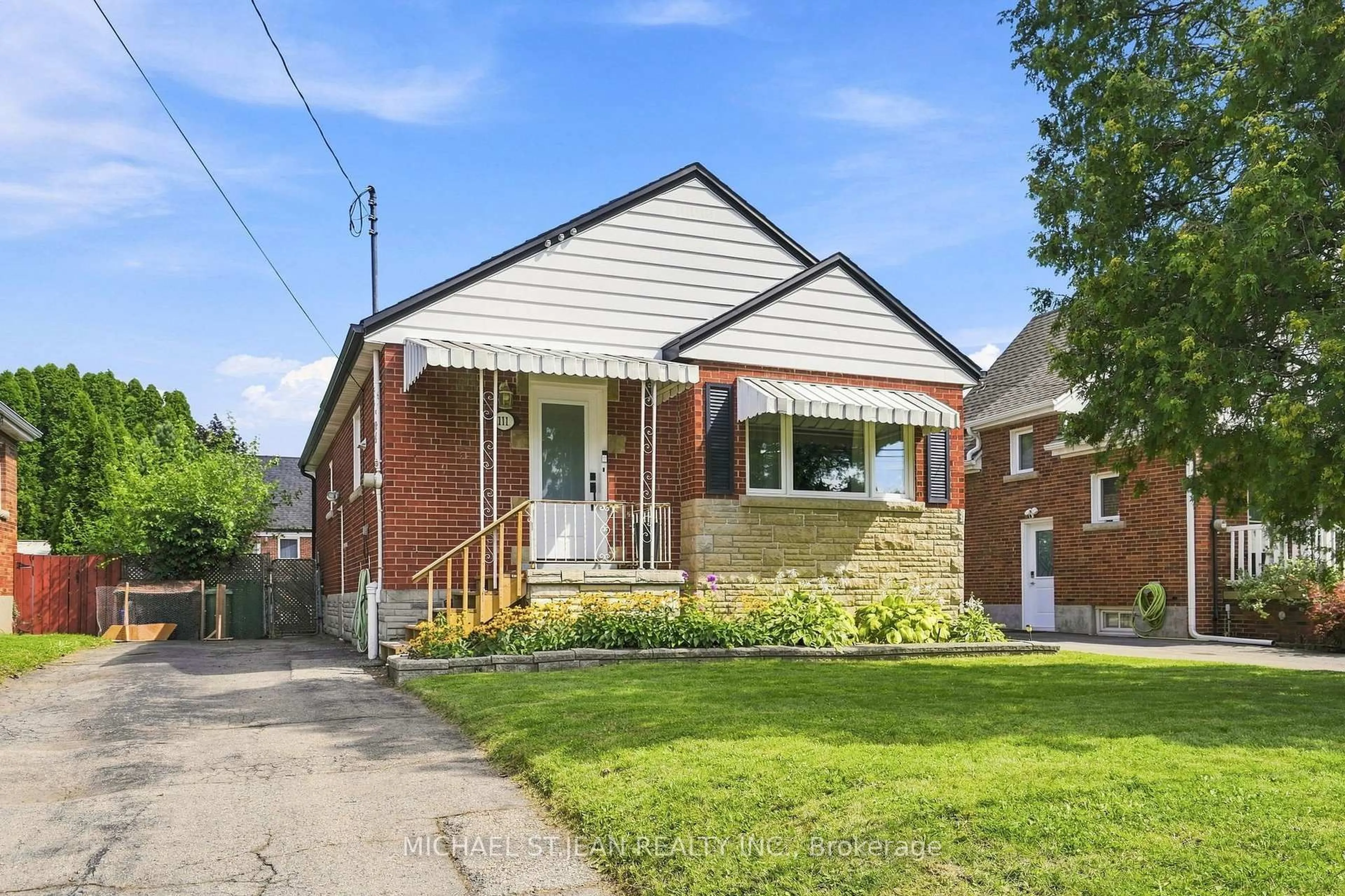 Home with brick exterior material, street for 111 Sharon Ave, Hamilton Ontario L8T 1E4