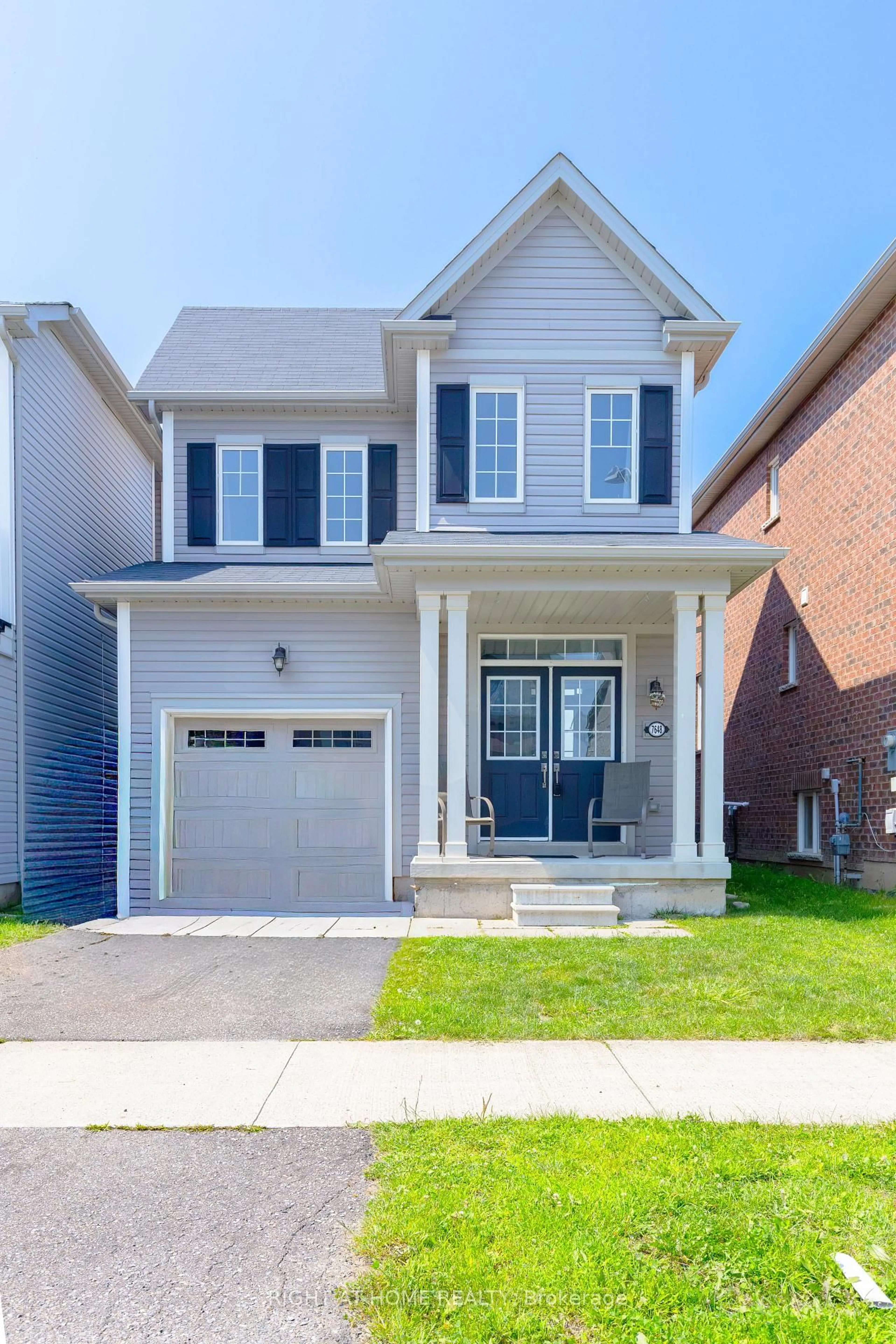 Home with brick exterior material, street for 7648 Hackberry Tr, Niagara Falls Ontario L2H 3R5