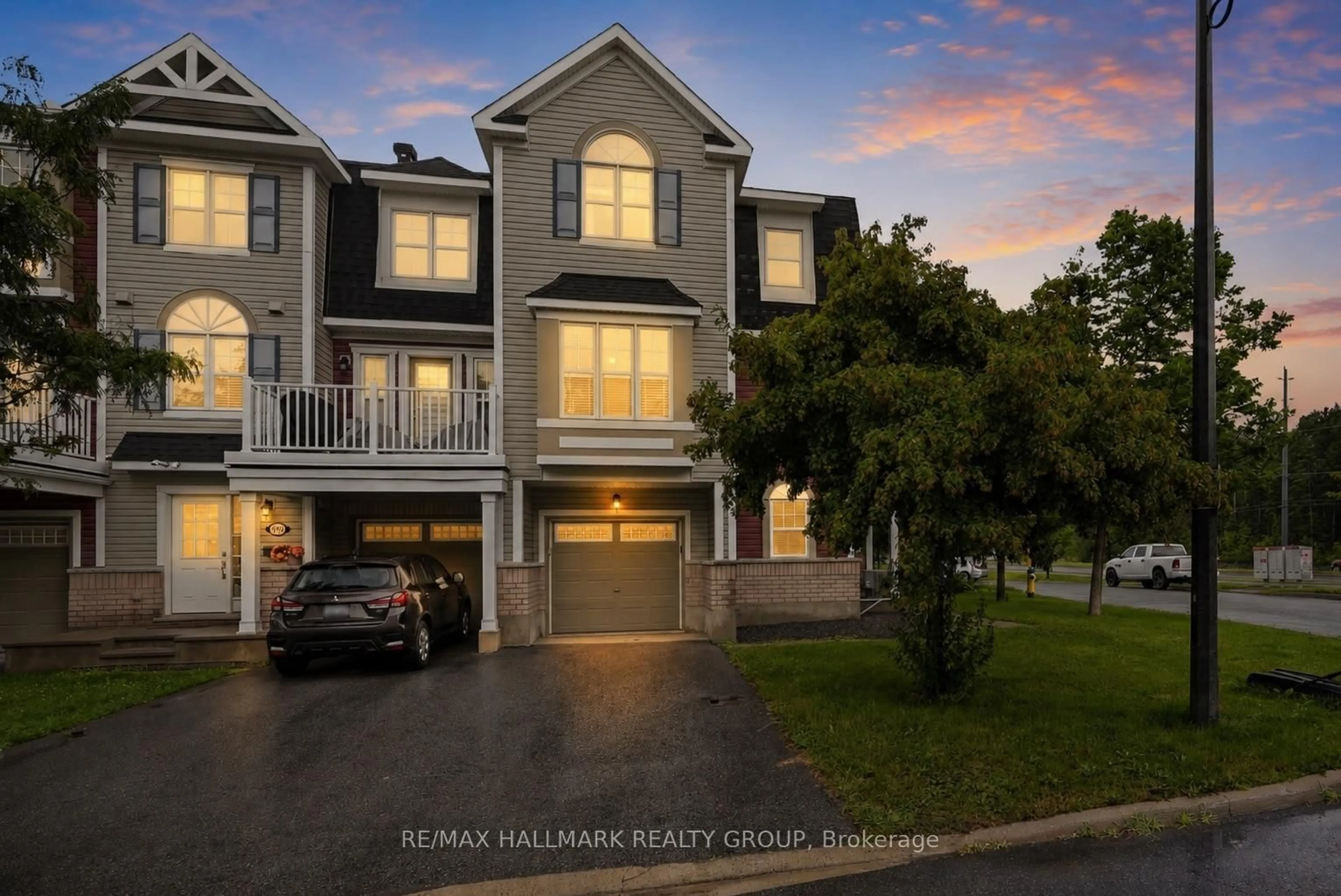 A pic from outside/outdoor area/front of a property/back of a property/a pic from drone, water/lake/river/ocean view for 588 Foxlight Circ, Ottawa Ontario K2M 0L9