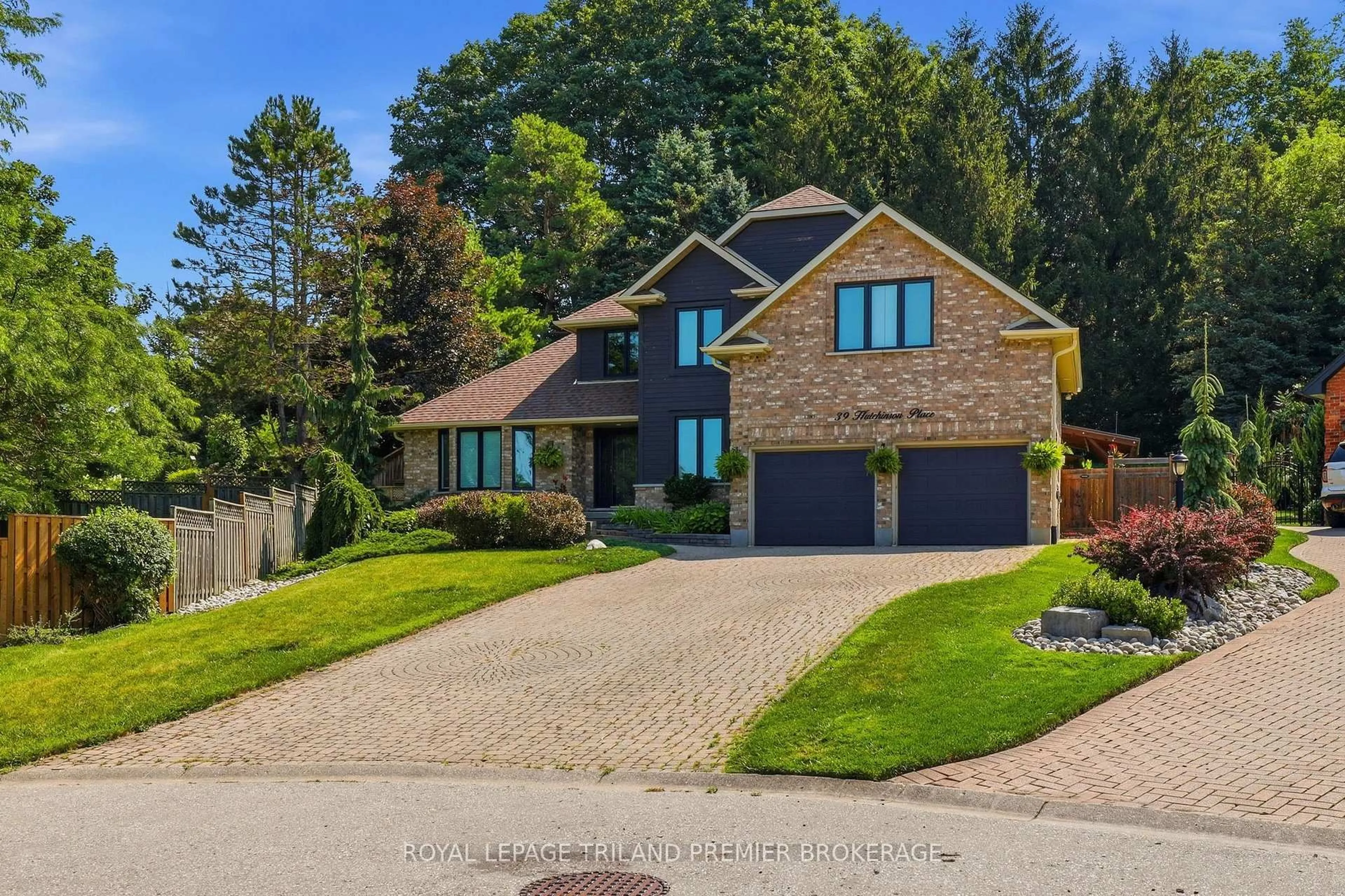 Home with brick exterior material, street for 39 Hutchinson Pl, Woodstock Ontario N4S 8V9