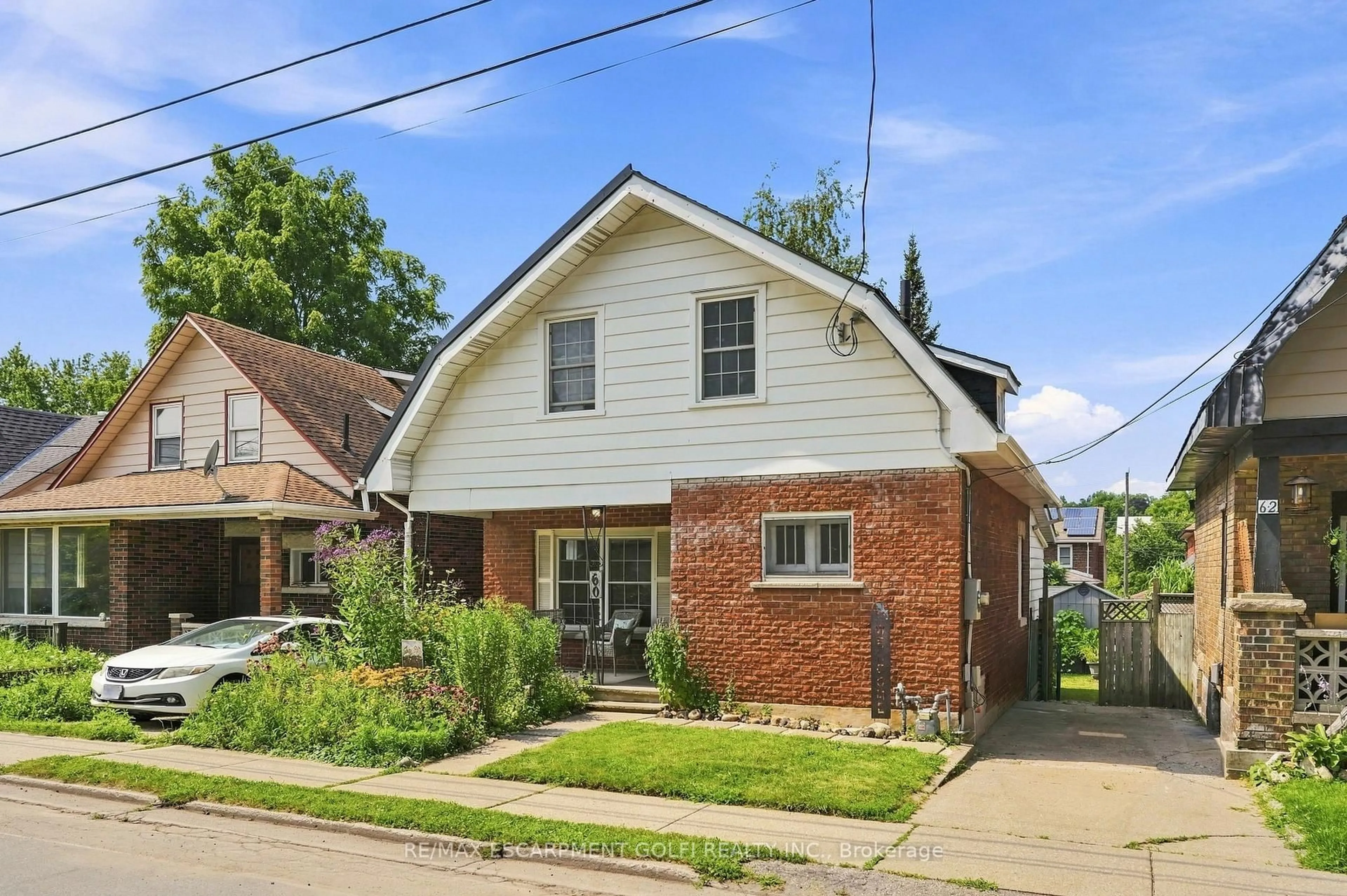 Home with brick exterior material, street for 60 Oliver St, Guelph Ontario N1E 3B5