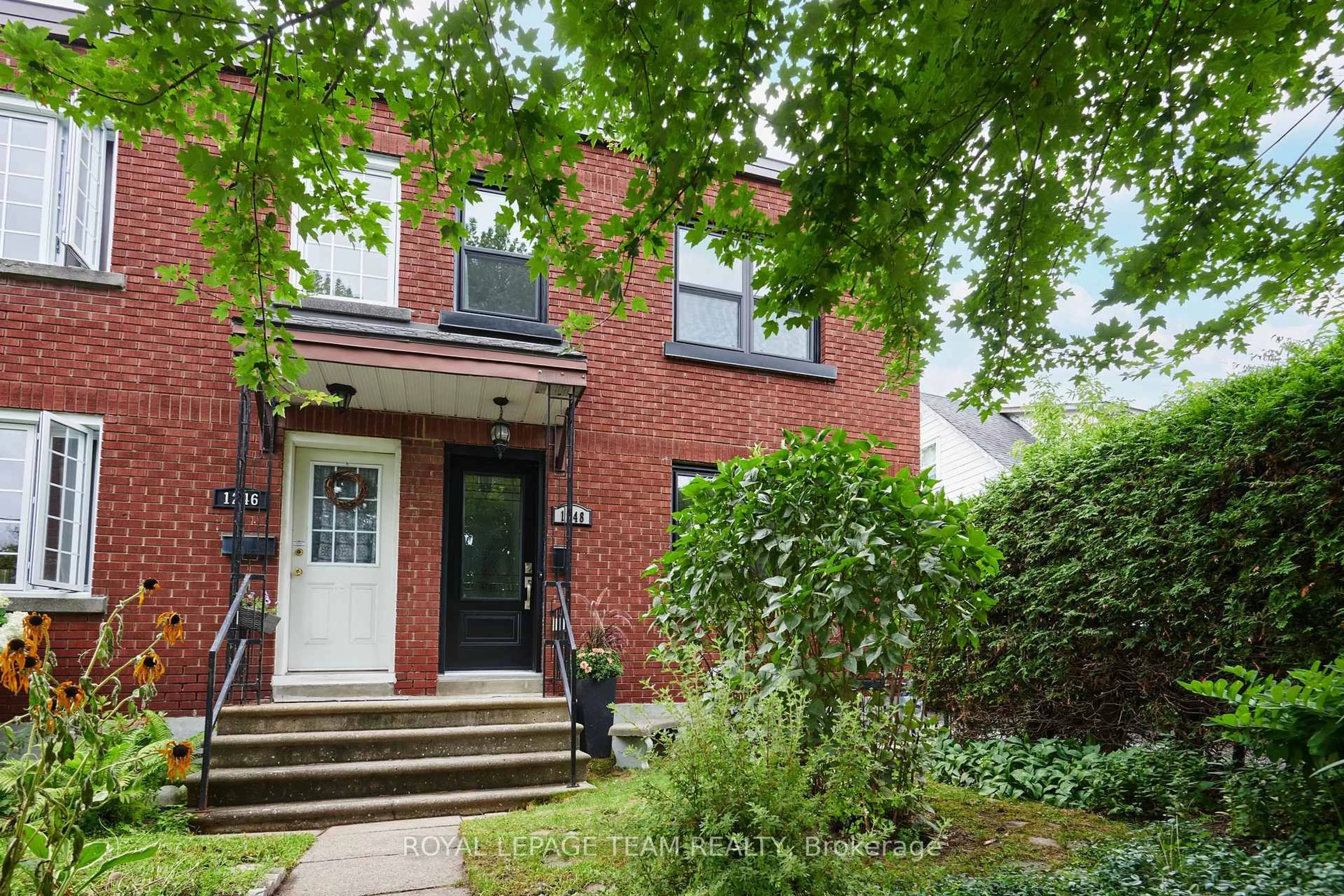 Home with brick exterior material, street for 1248 Summerville Ave, Ottawa Ontario K1Z 8G5