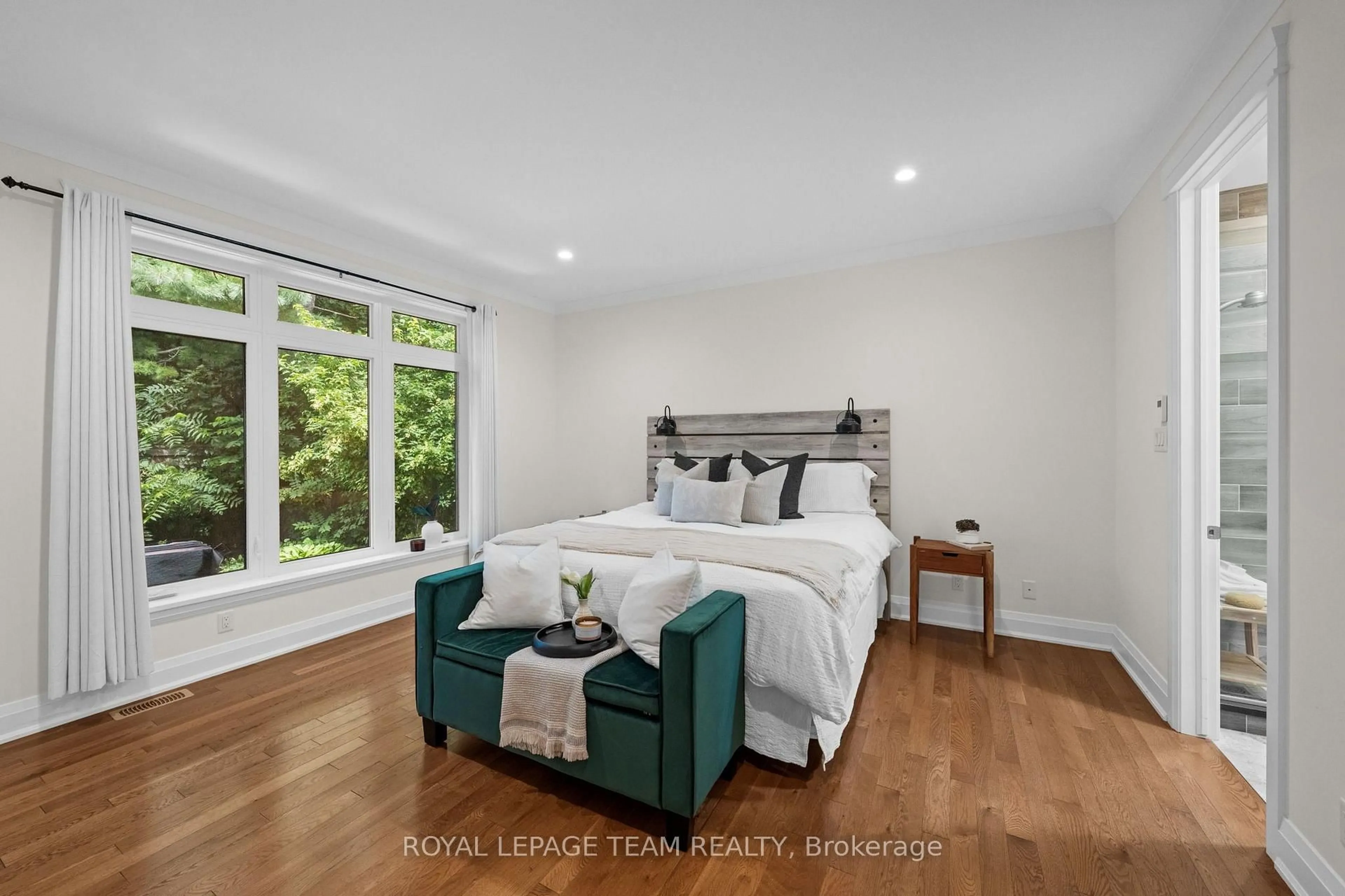 Bedroom with bed, wood/laminate floor for 77 Juanita Ave, Carp Ontario K0A 1L0