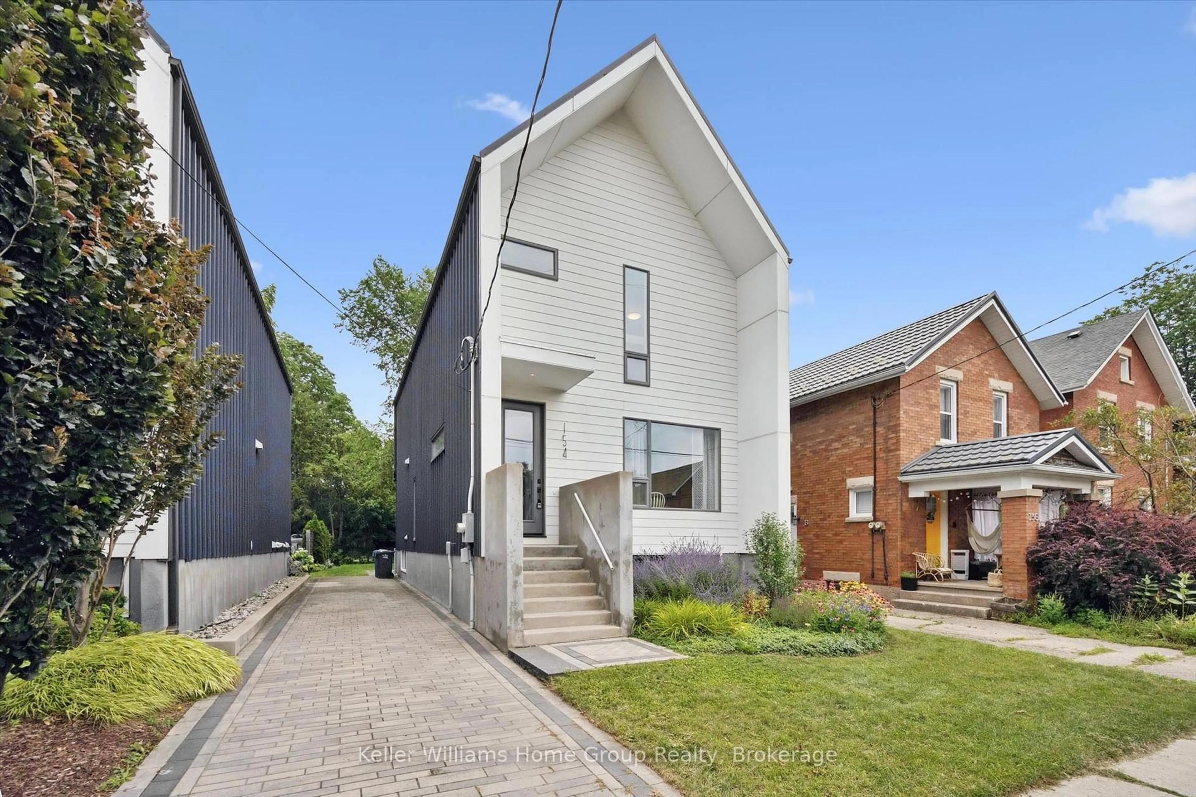 Home with brick exterior material, street for 154 Ontario St, Guelph Ontario N1E 3B4