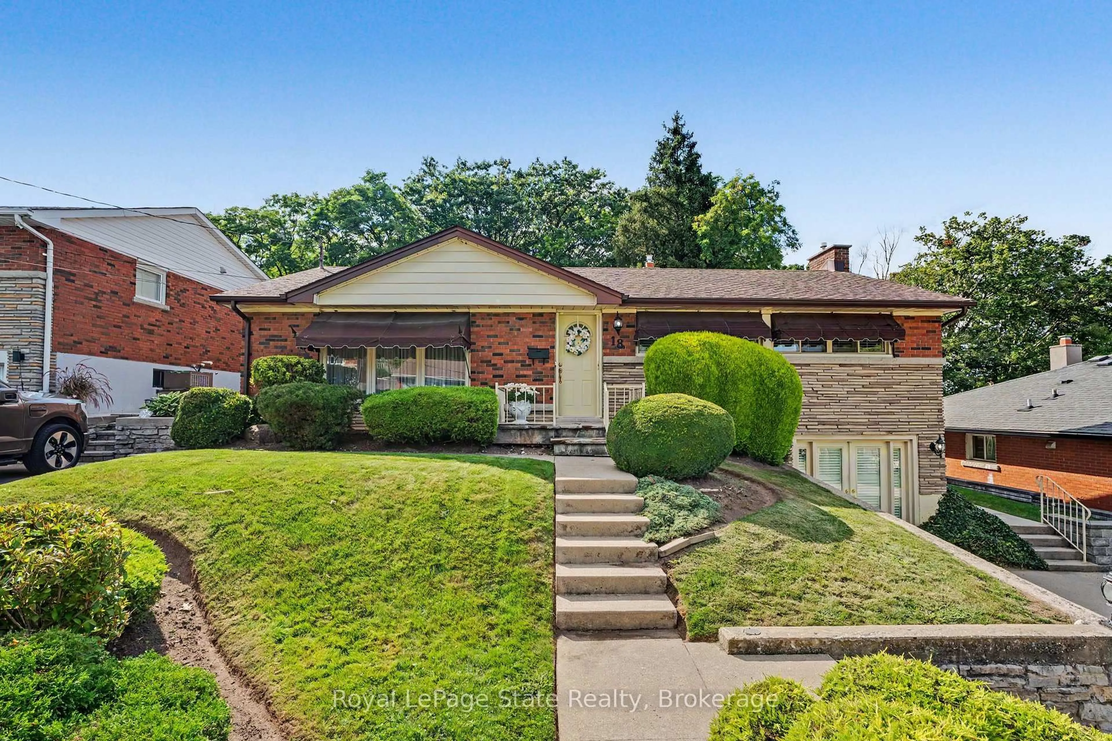 Home with brick exterior material, street for 18 Battlefield Dr, Hamilton Ontario L8G 1T7