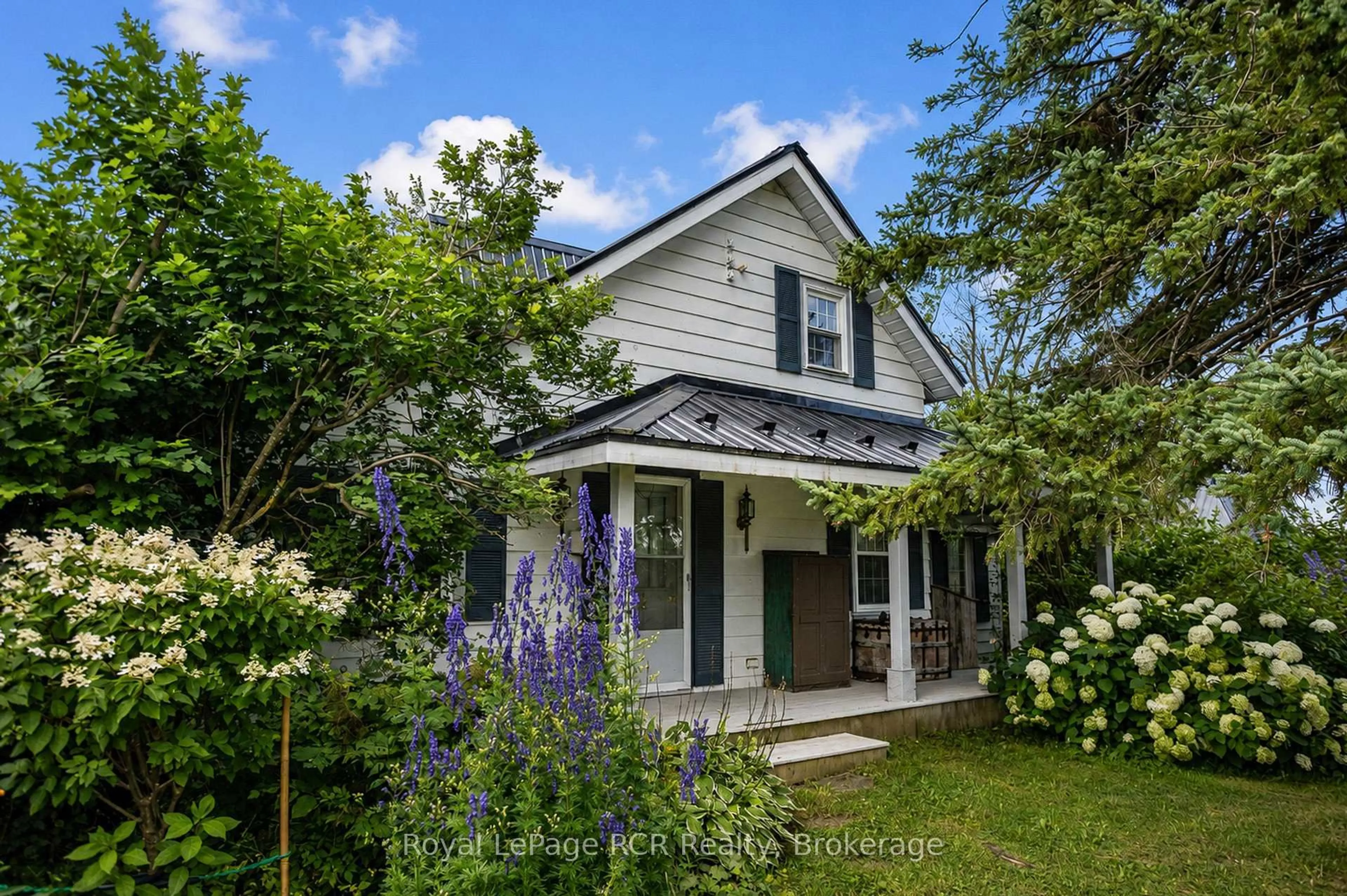Home with vinyl exterior material, street for 309158 Centre Line B, Grey Highlands Ontario N0C 1A0