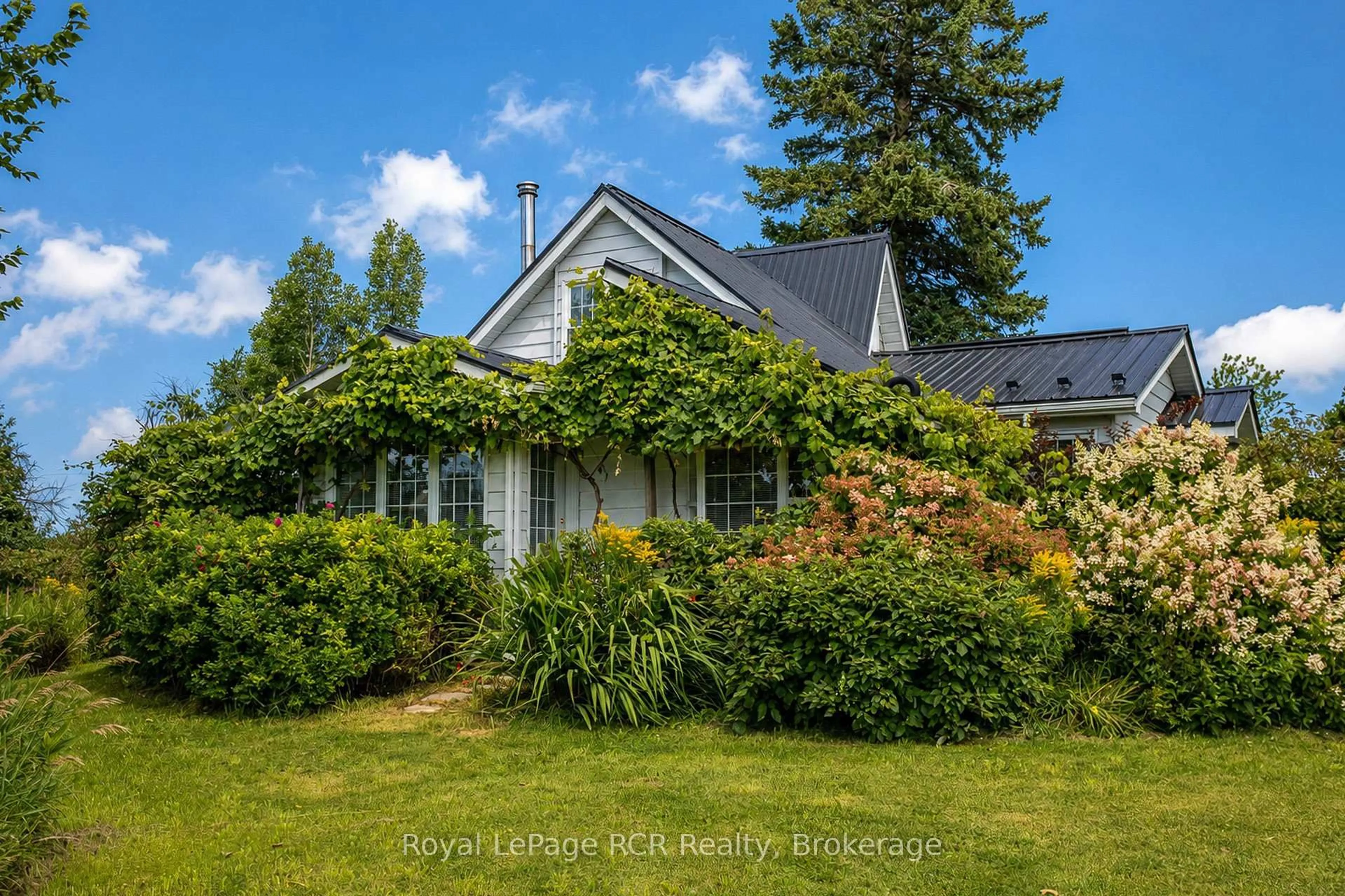 A pic from outside/outdoor area/front of a property/back of a property/a pic from drone, unknown for 309158 Centre Line B, Grey Highlands Ontario N0C 1A0